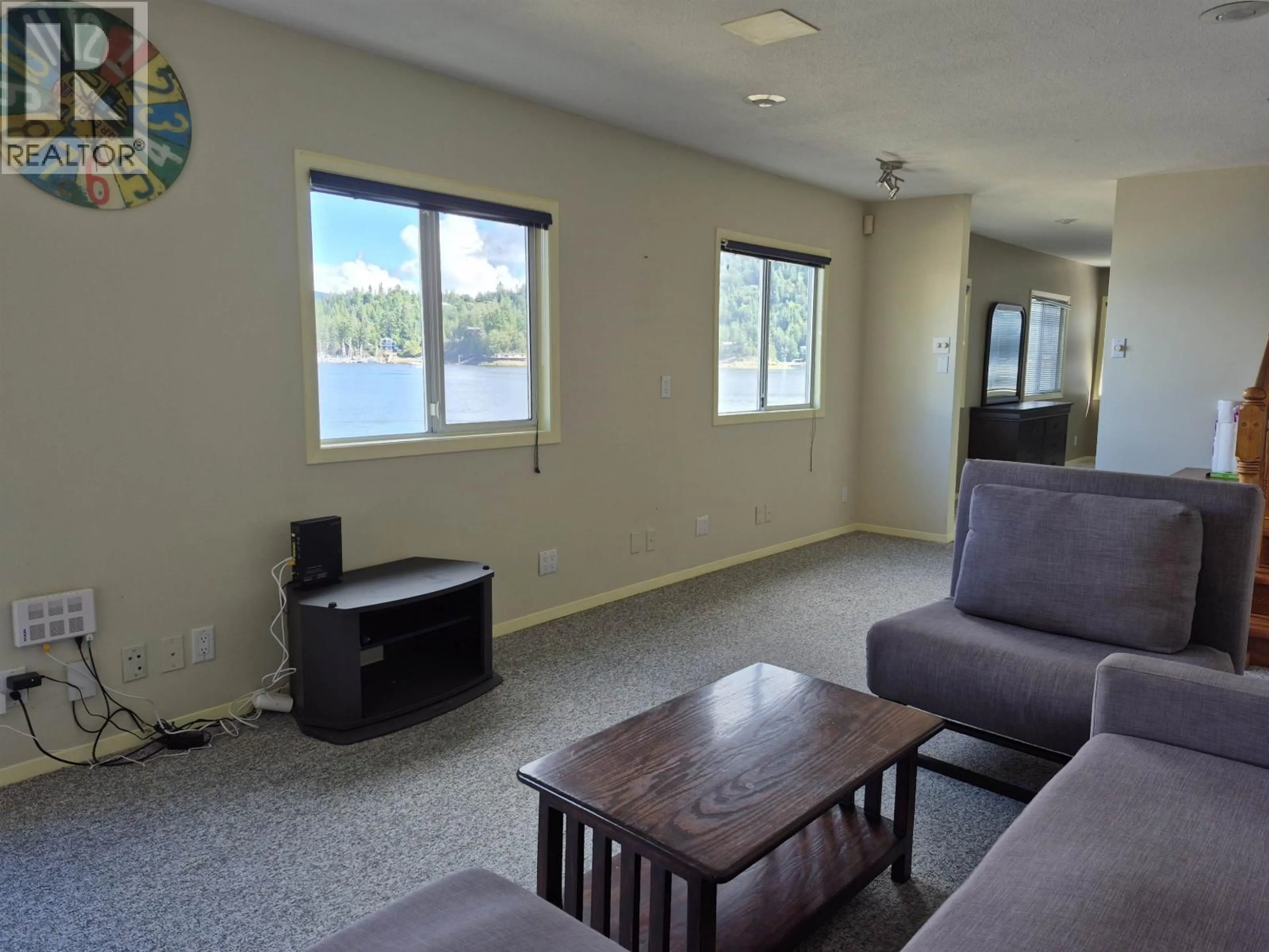 Living room with furniture, unknown for 13044 HASSAN ROAD, Pender Harbour British Columbia V0N2H1