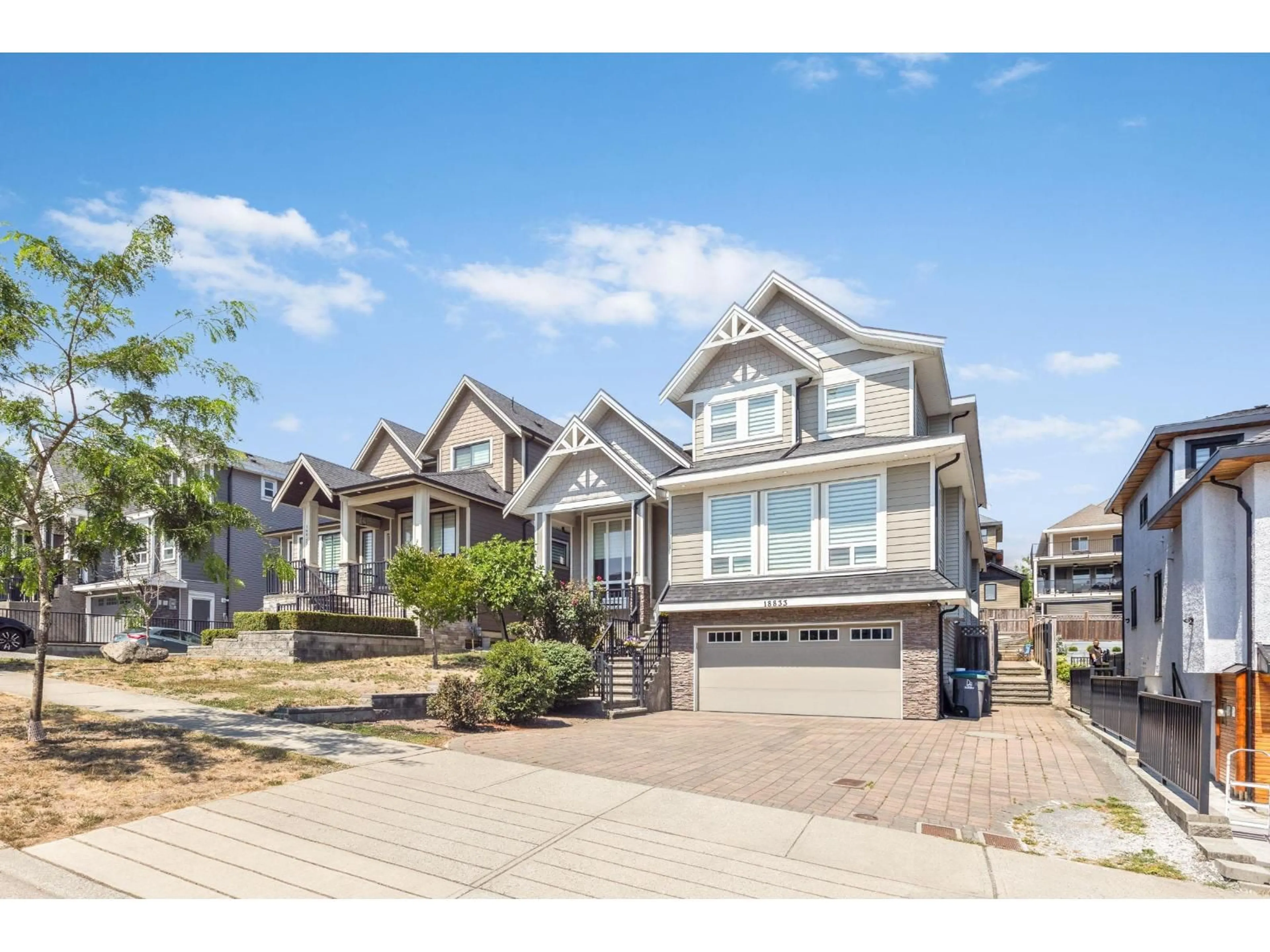 Home with vinyl exterior material, street for 18833 54A AVENUE, Surrey British Columbia V3S6R4