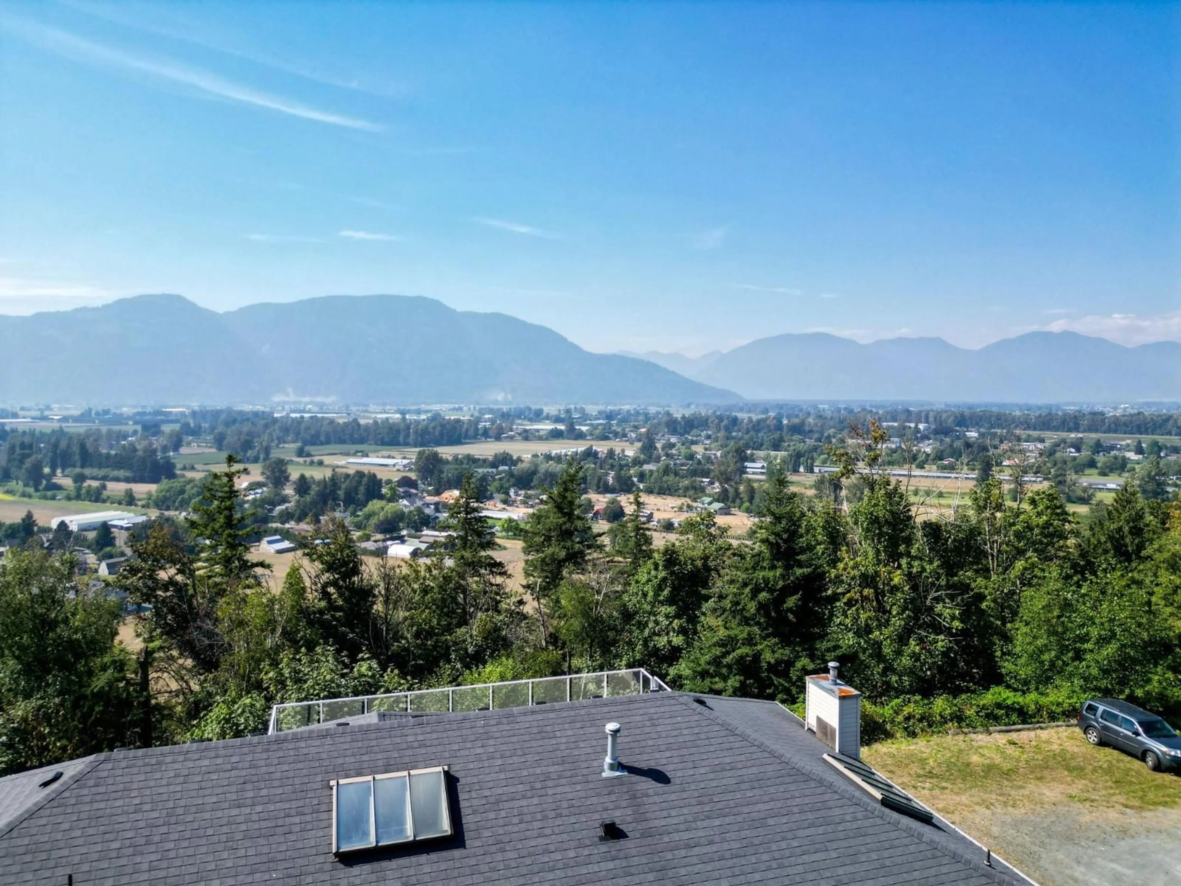 A pic from outside/outdoor area/front of a property/back of a property/a pic from drone, mountain view for 42025 NIKADA DRIVE, Yarrow British Columbia V2R5H2