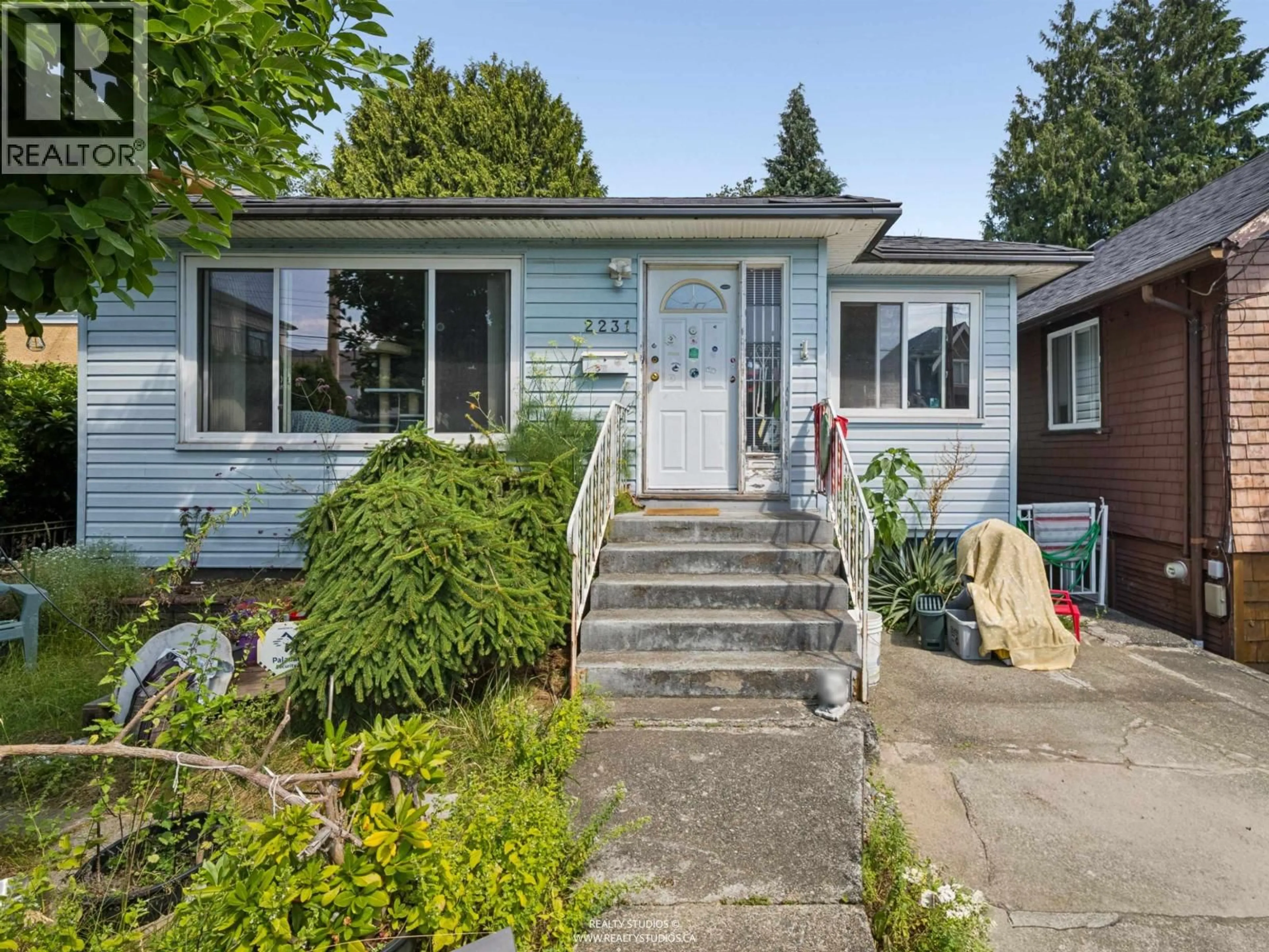 Home with vinyl exterior material, street for 2231 25TH AVENUE, Vancouver British Columbia V5N2V7