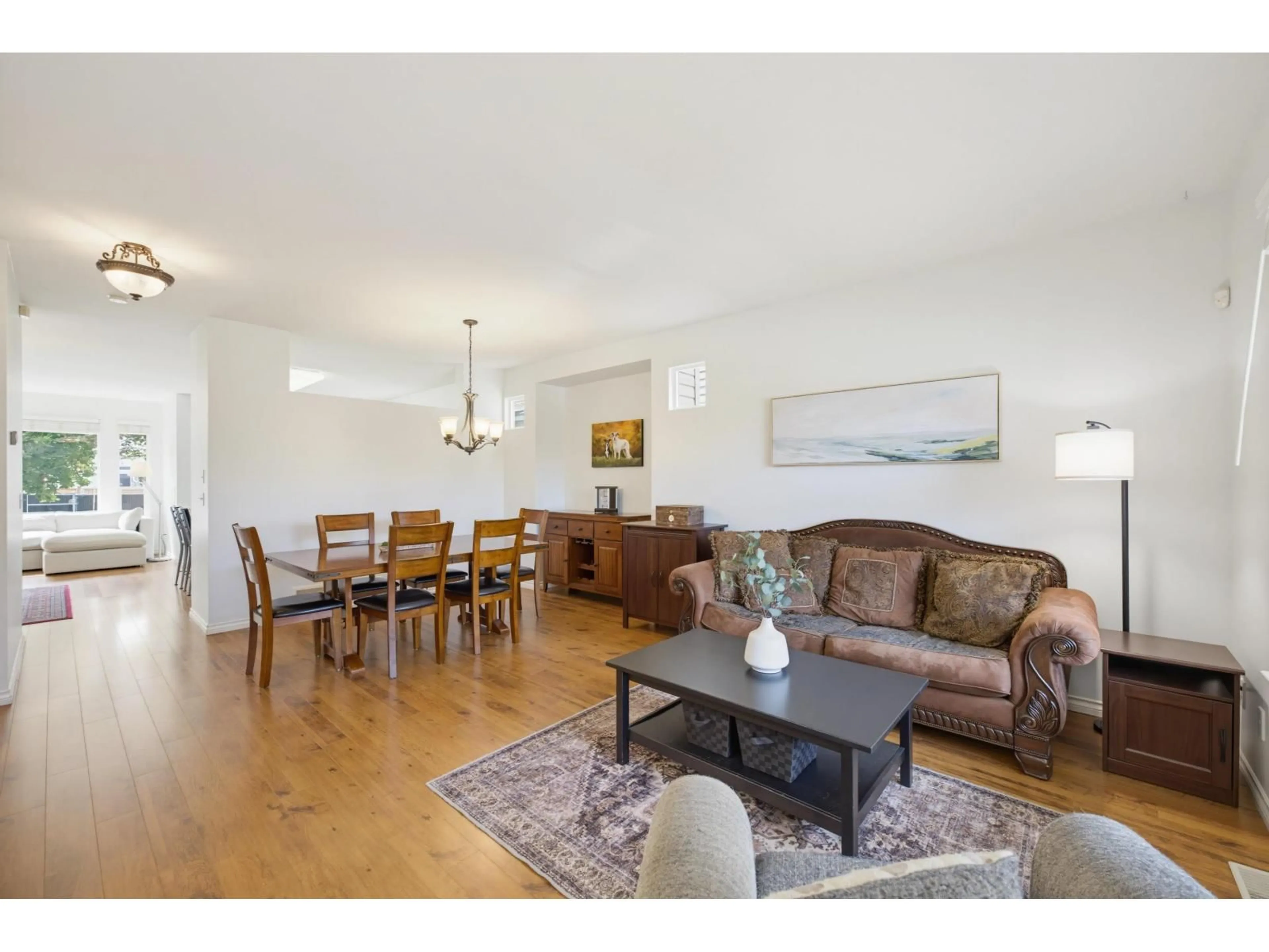 Living room with furniture, wood/laminate floor for 6725 184A STREET, Surrey British Columbia V3S9A8