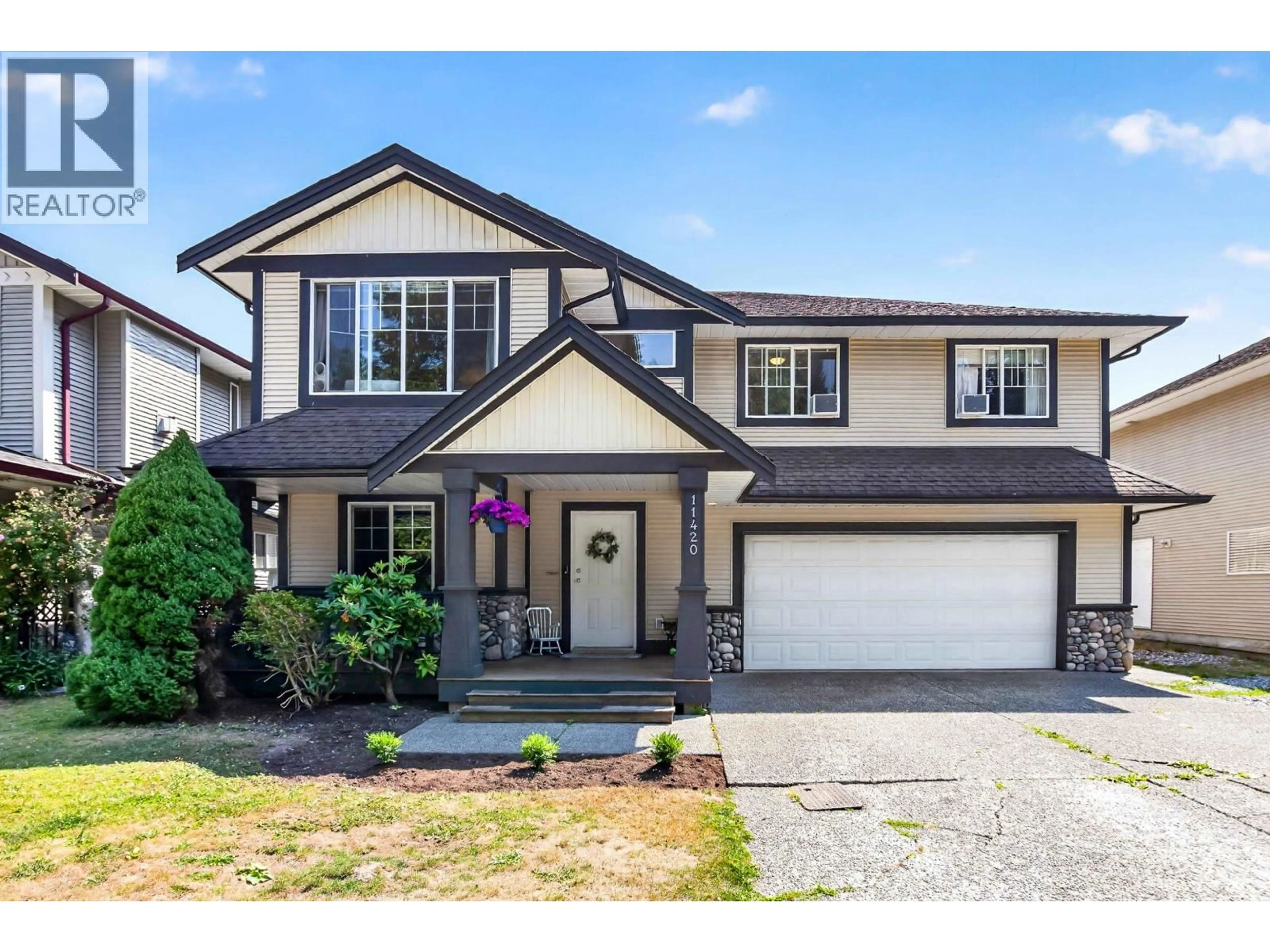 Home with vinyl exterior material, street for 11420 236 STREET, Maple Ridge British Columbia V2W2A3
