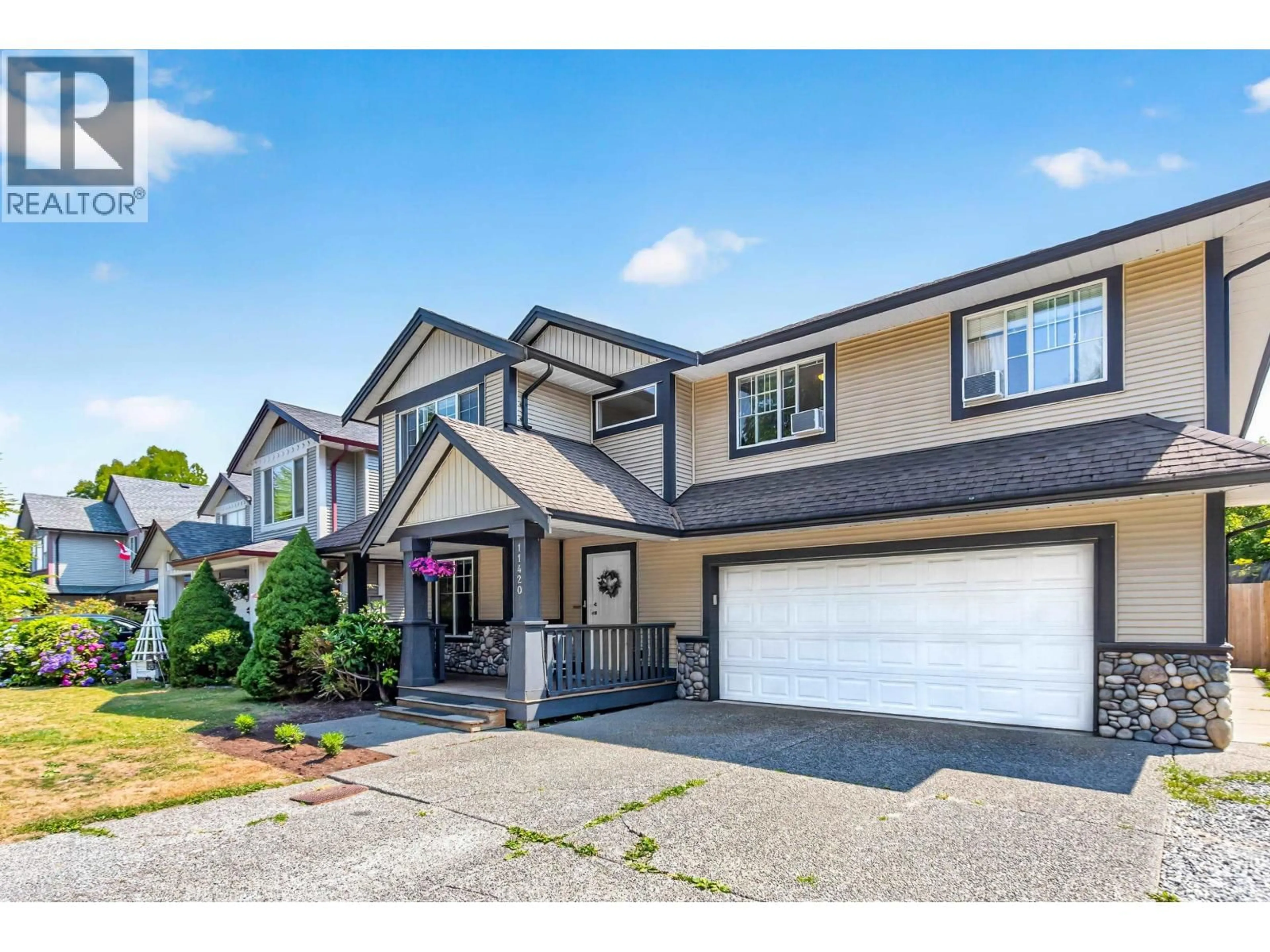 Home with vinyl exterior material, street for 11420 236 STREET, Maple Ridge British Columbia V2W2A3