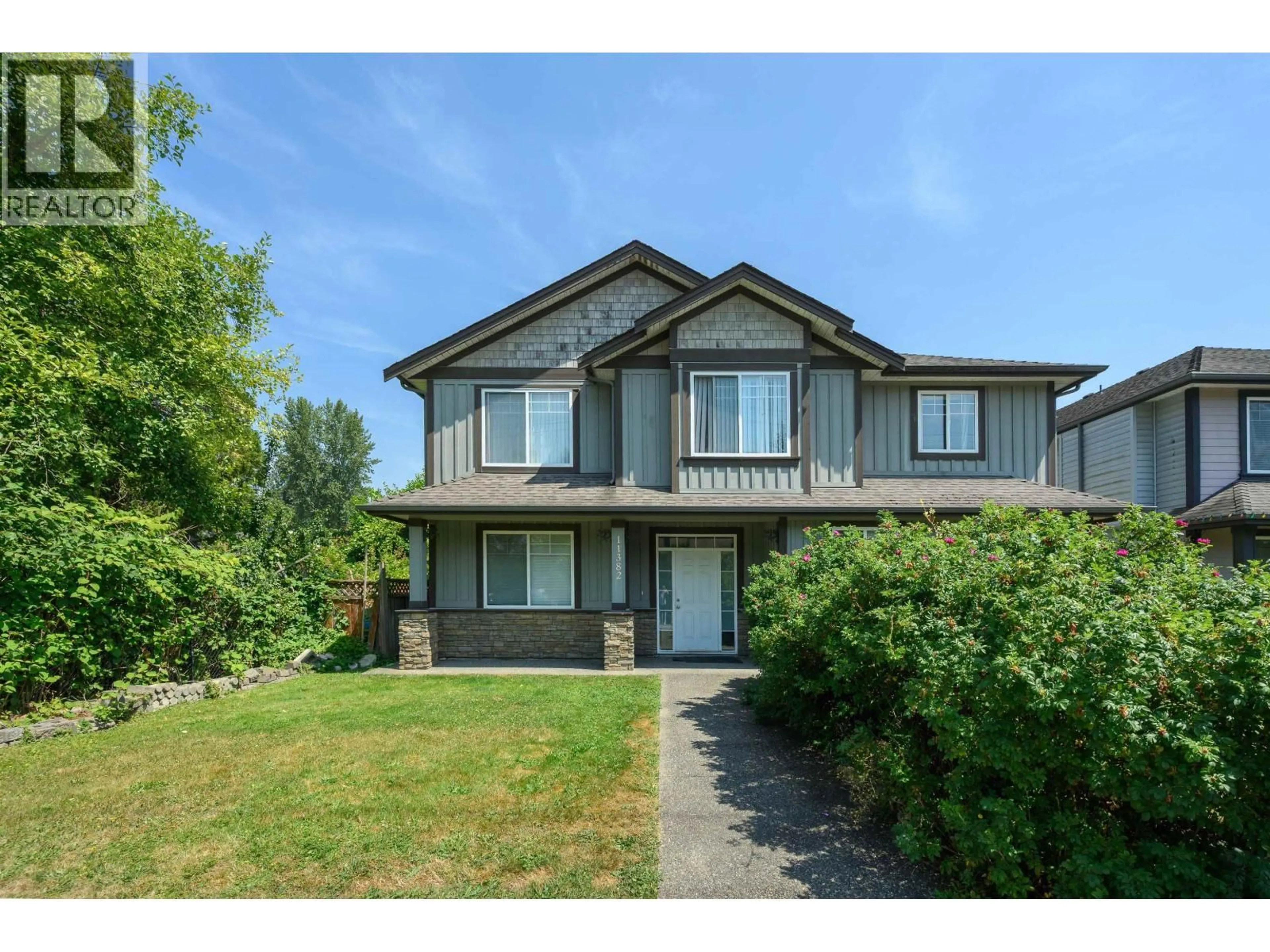 Home with vinyl exterior material, street for 11382 240 STREET, Maple Ridge British Columbia V2W0B4