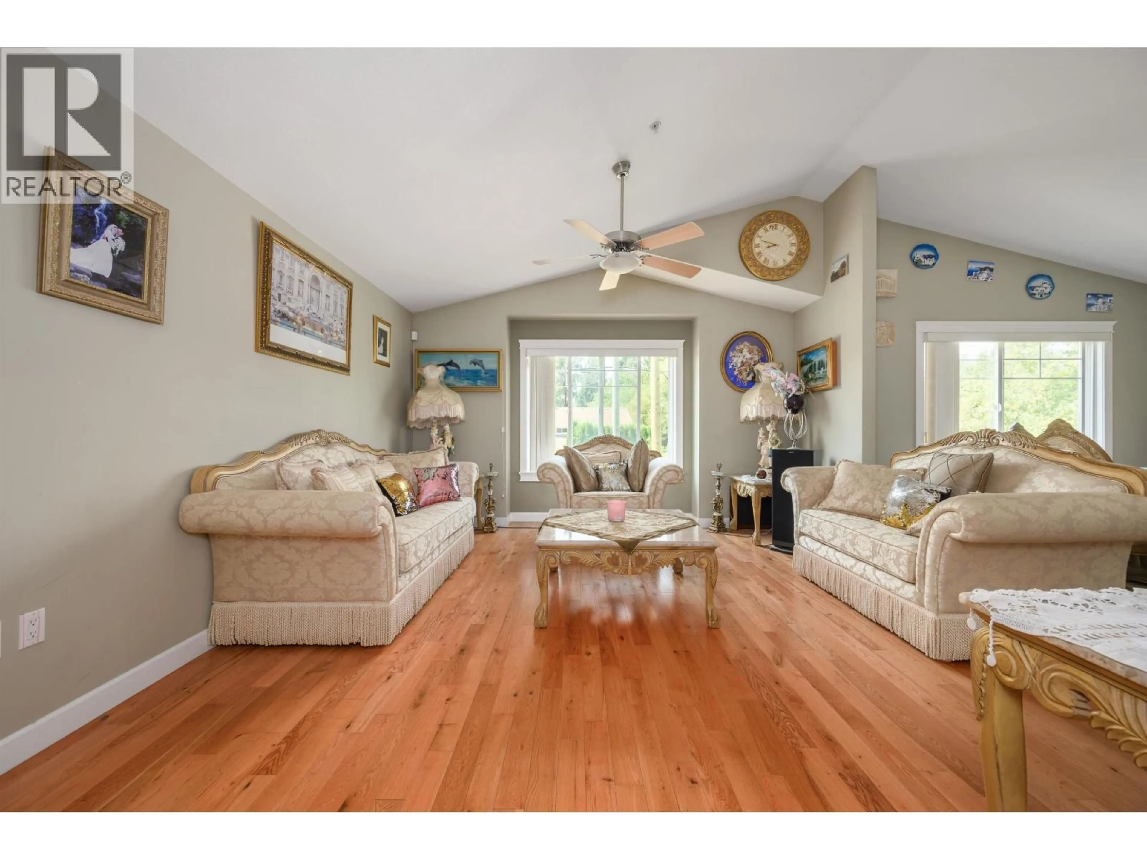 Living room with furniture, wood/laminate floor for 11382 240 STREET, Maple Ridge British Columbia V2W0B4