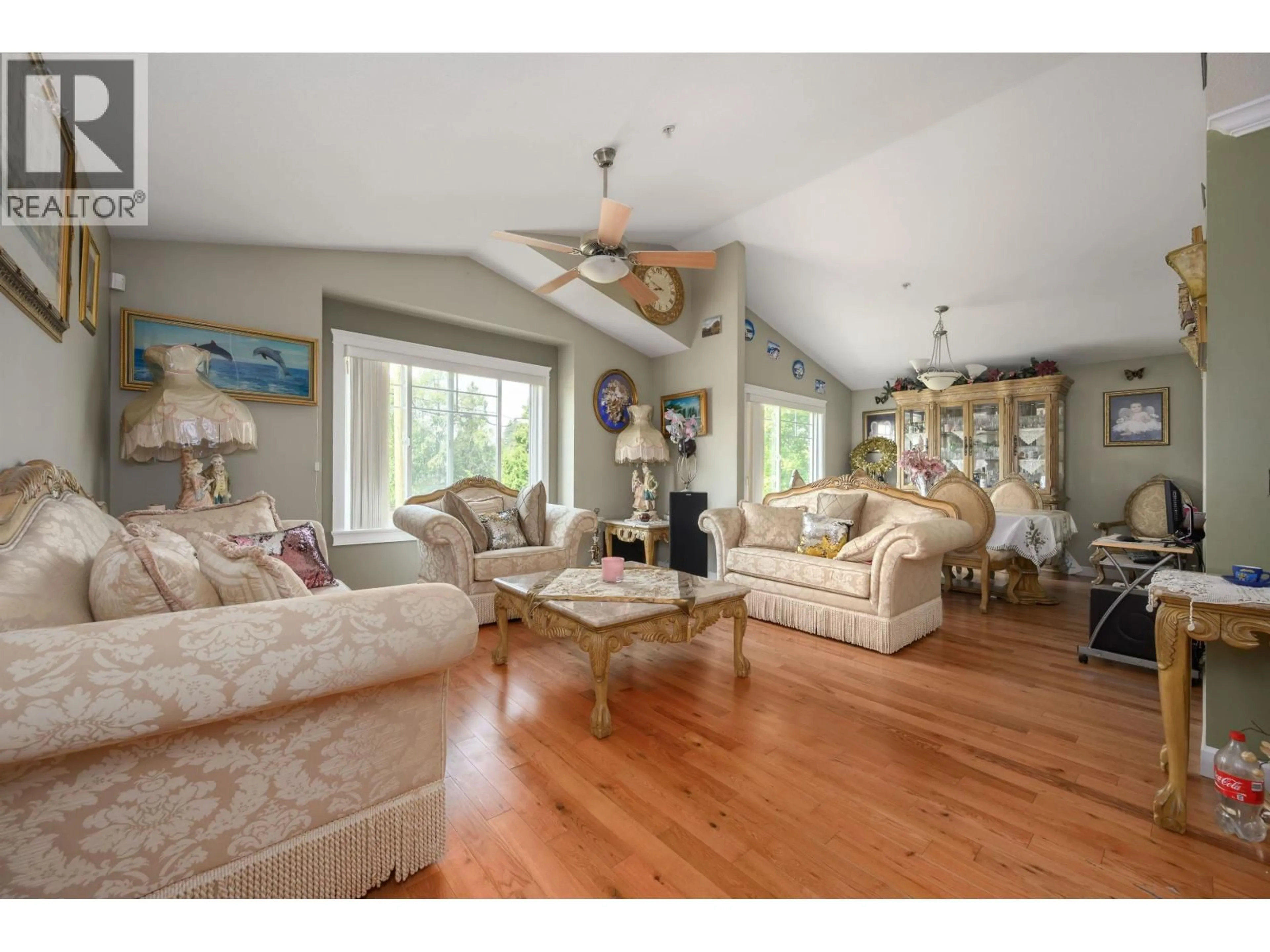 Living room with furniture, wood/laminate floor for 11382 240 STREET, Maple Ridge British Columbia V2W0B4