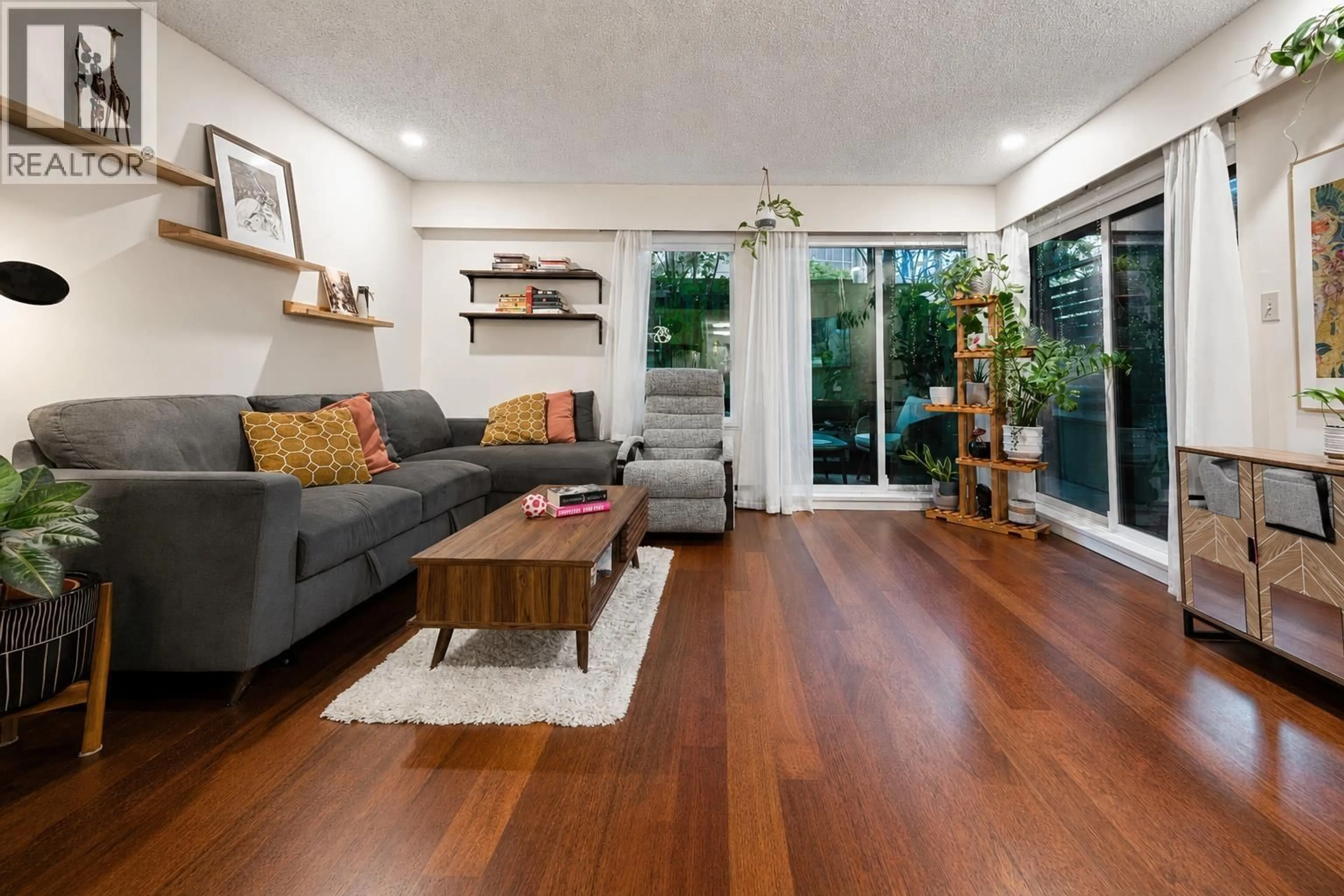 Living room with furniture, wood/laminate floor for 112 - 1274 BARCLAY STREET, Vancouver British Columbia V6E1H3