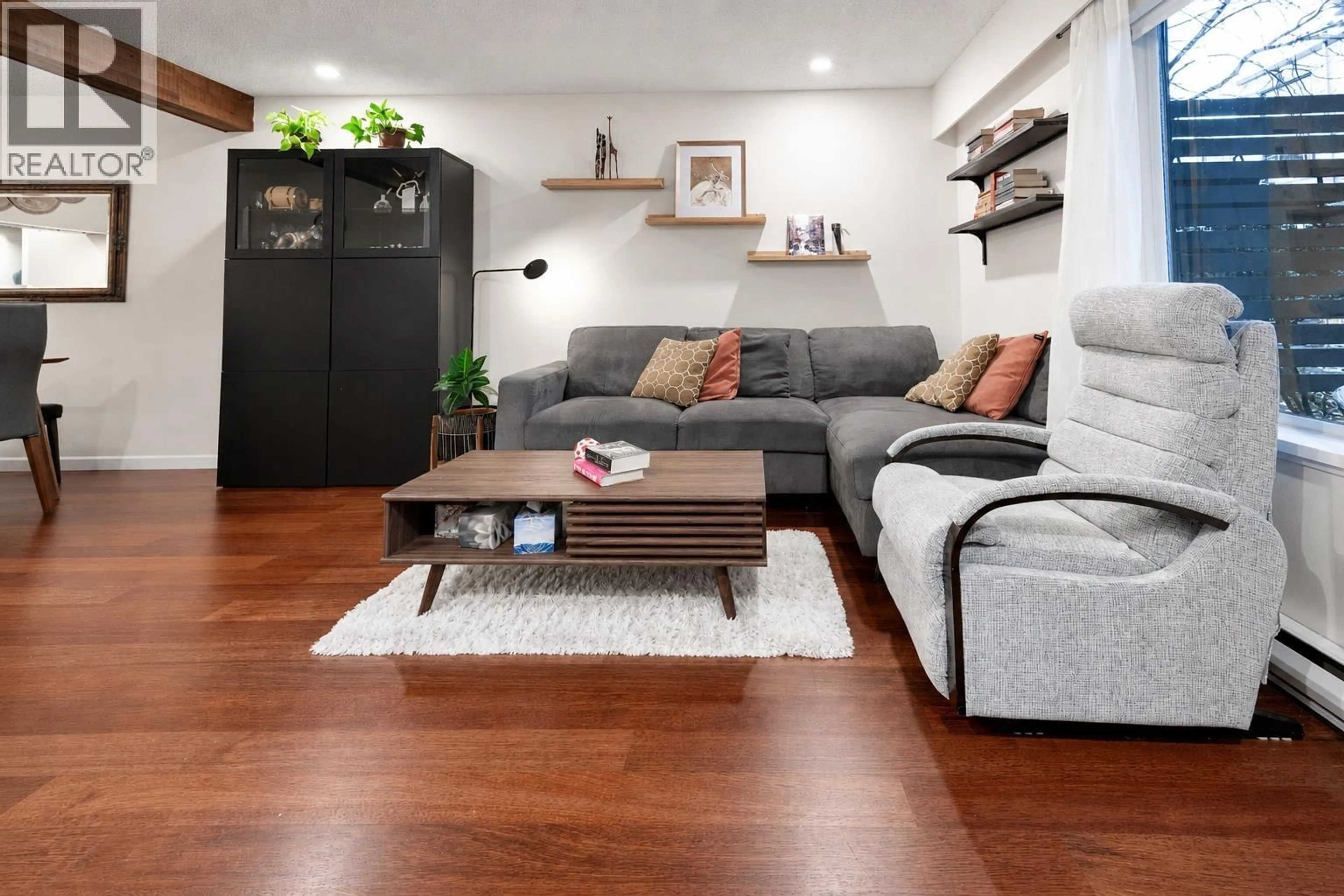 Living room with furniture, wood/laminate floor for 112 - 1274 BARCLAY STREET, Vancouver British Columbia V6E1H3