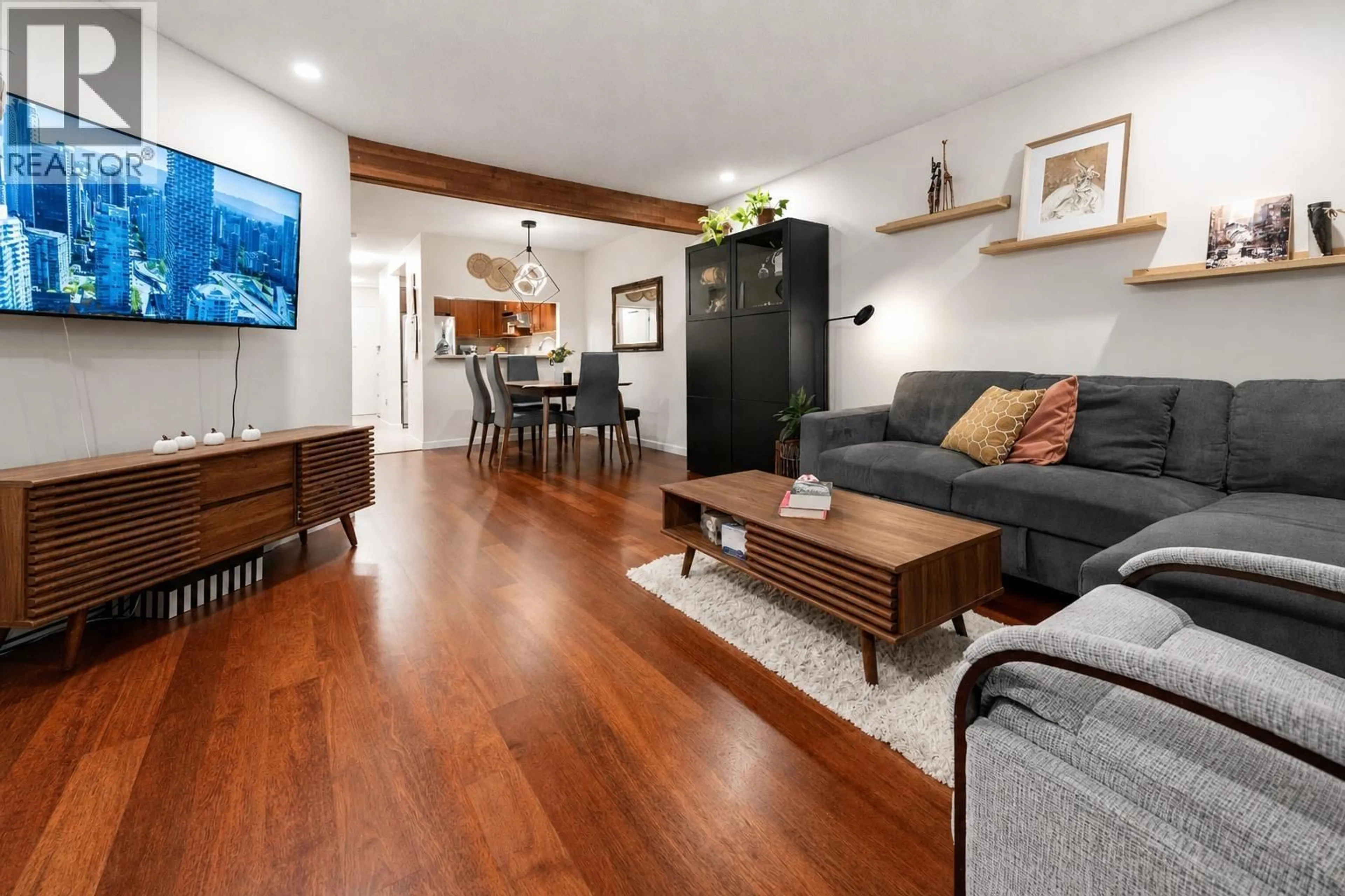 Living room with furniture, wood/laminate floor for 112 - 1274 BARCLAY STREET, Vancouver British Columbia V6E1H3