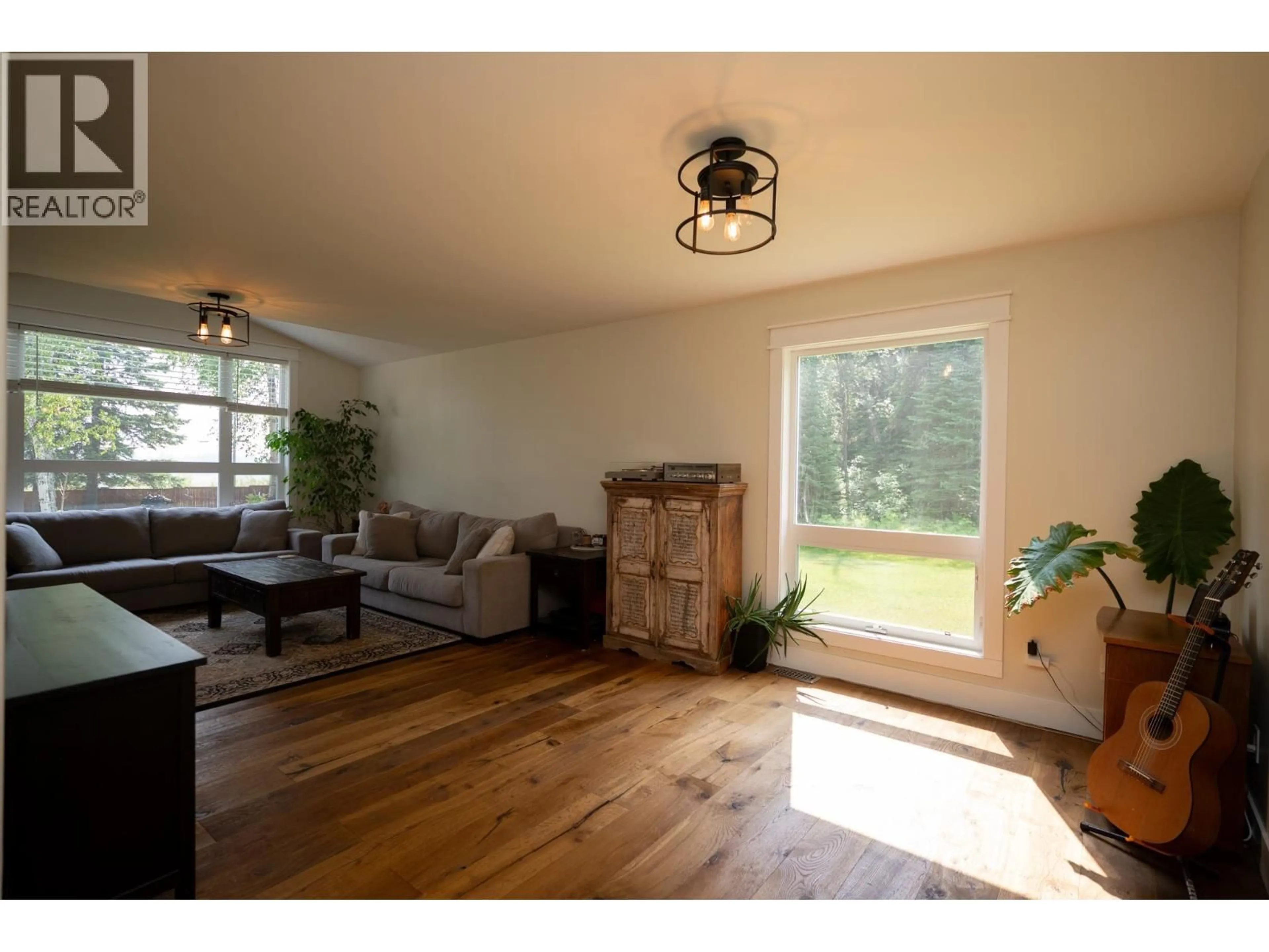 Living room with furniture, wood/laminate floor for 9611 KELLY ROAD, Prince George British Columbia V2K5V1