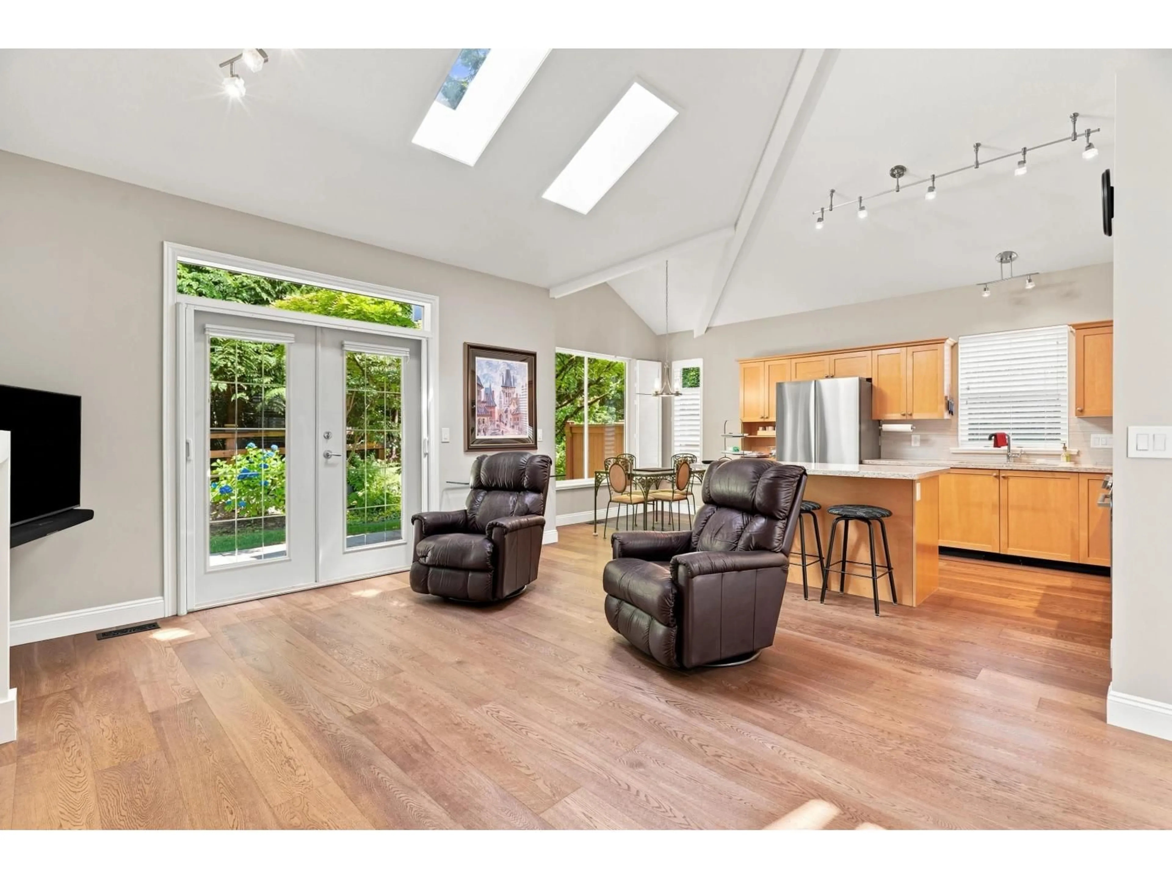 Open concept kitchen, wood/laminate floor for 22 - 3500 144 STREET, Surrey British Columbia V4P3J6