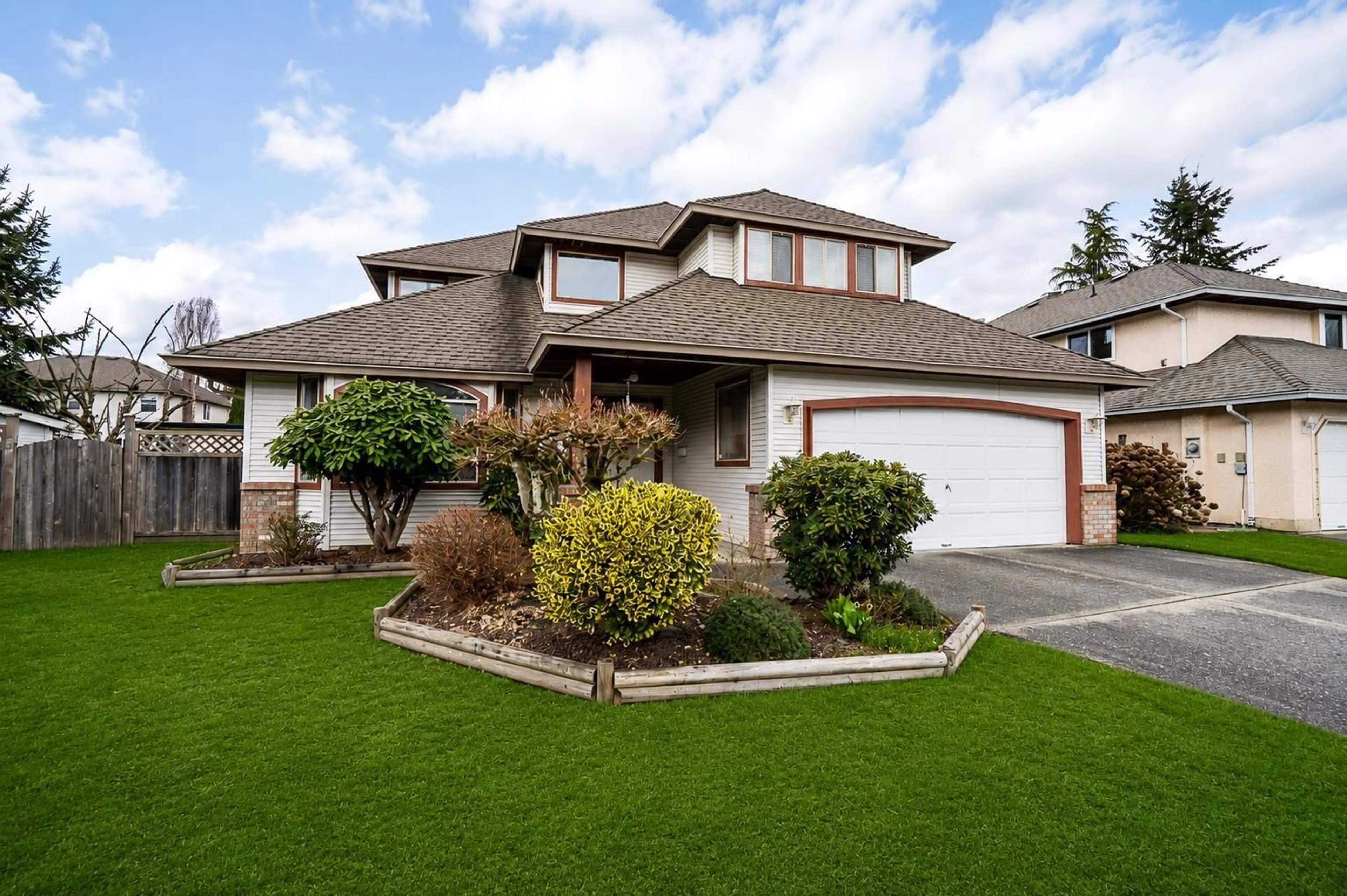 Home with vinyl exterior material, street for 16156 94A AVENUE, Surrey British Columbia V4N3A2