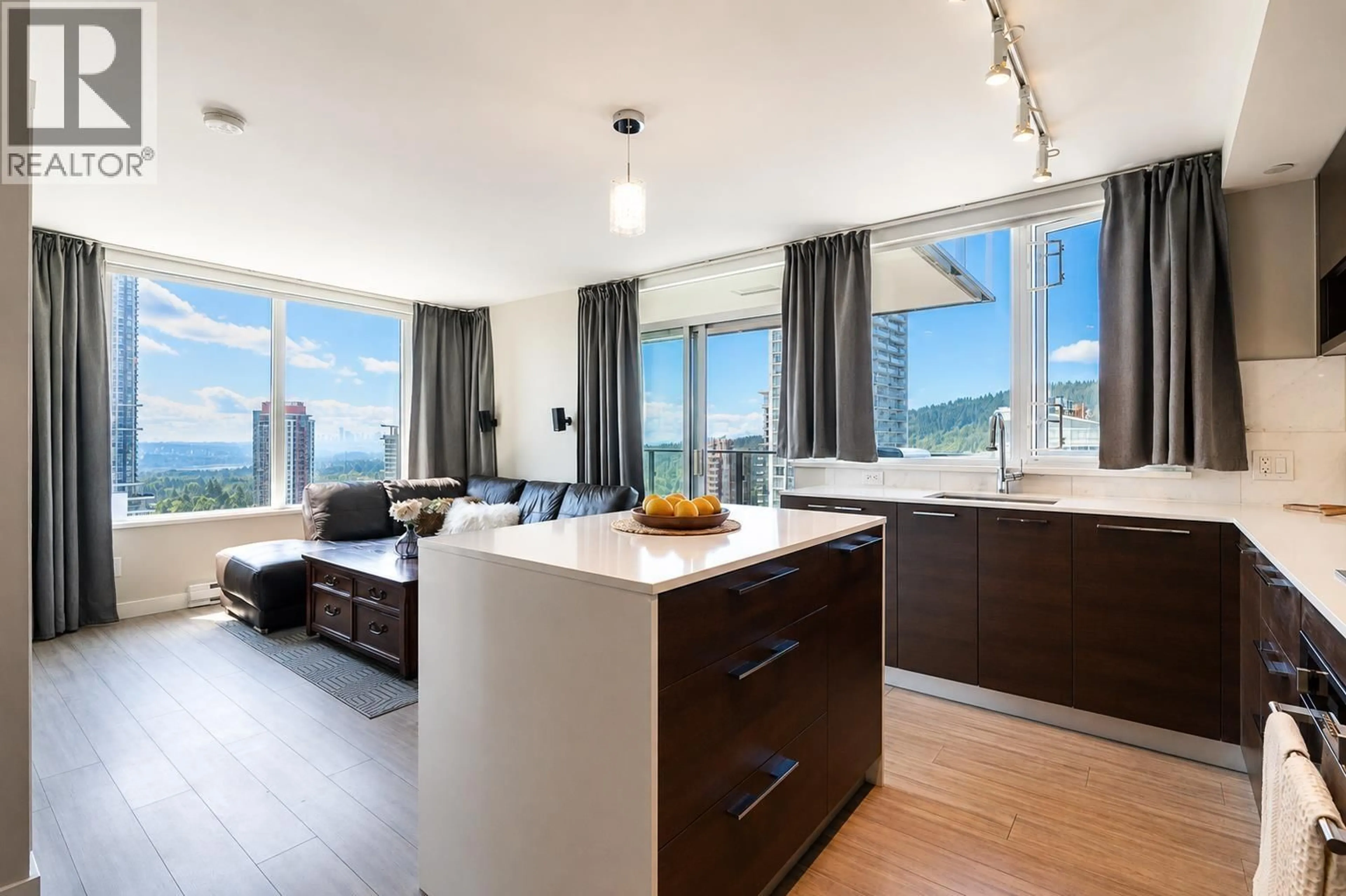 Open concept kitchen, wood/laminate floor for 2002 - 570 EMERSON STREET, Coquitlam British Columbia V3J0G3