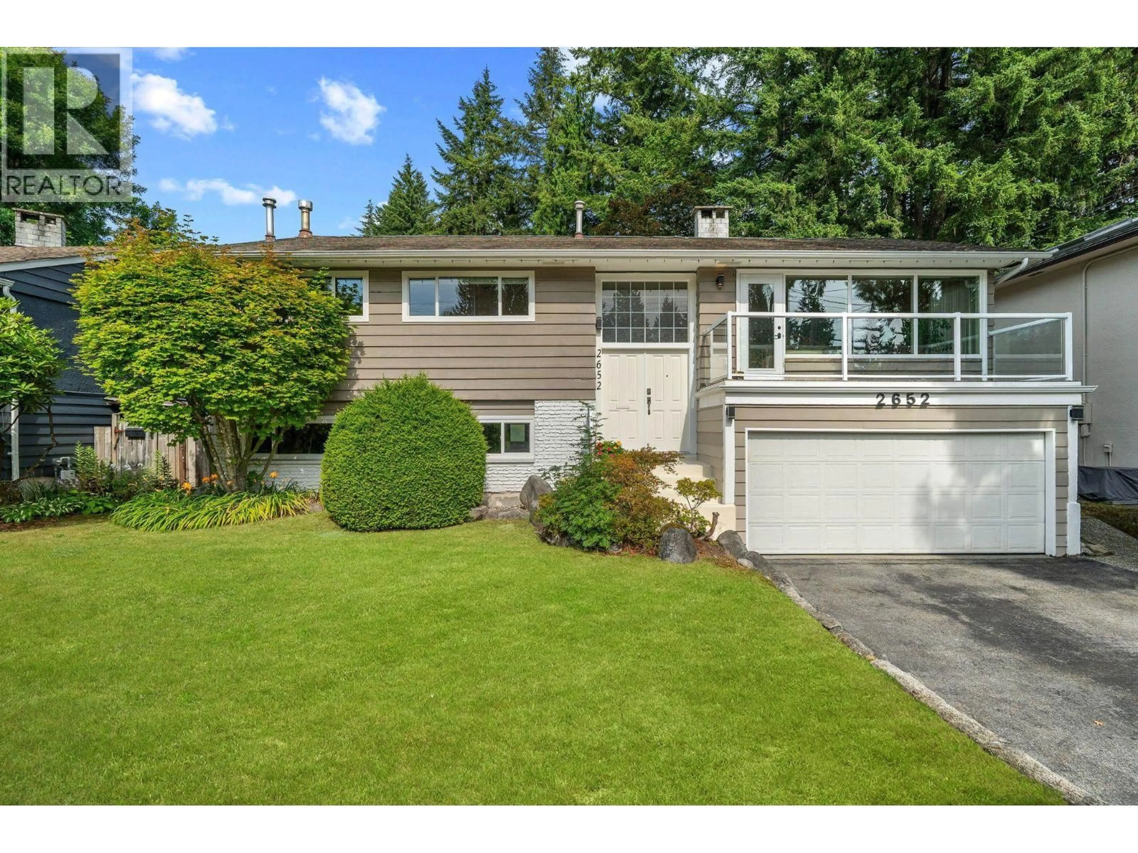 Home with vinyl exterior material, street for 2652 HOSKINS ROAD, North Vancouver British Columbia V7J3A3