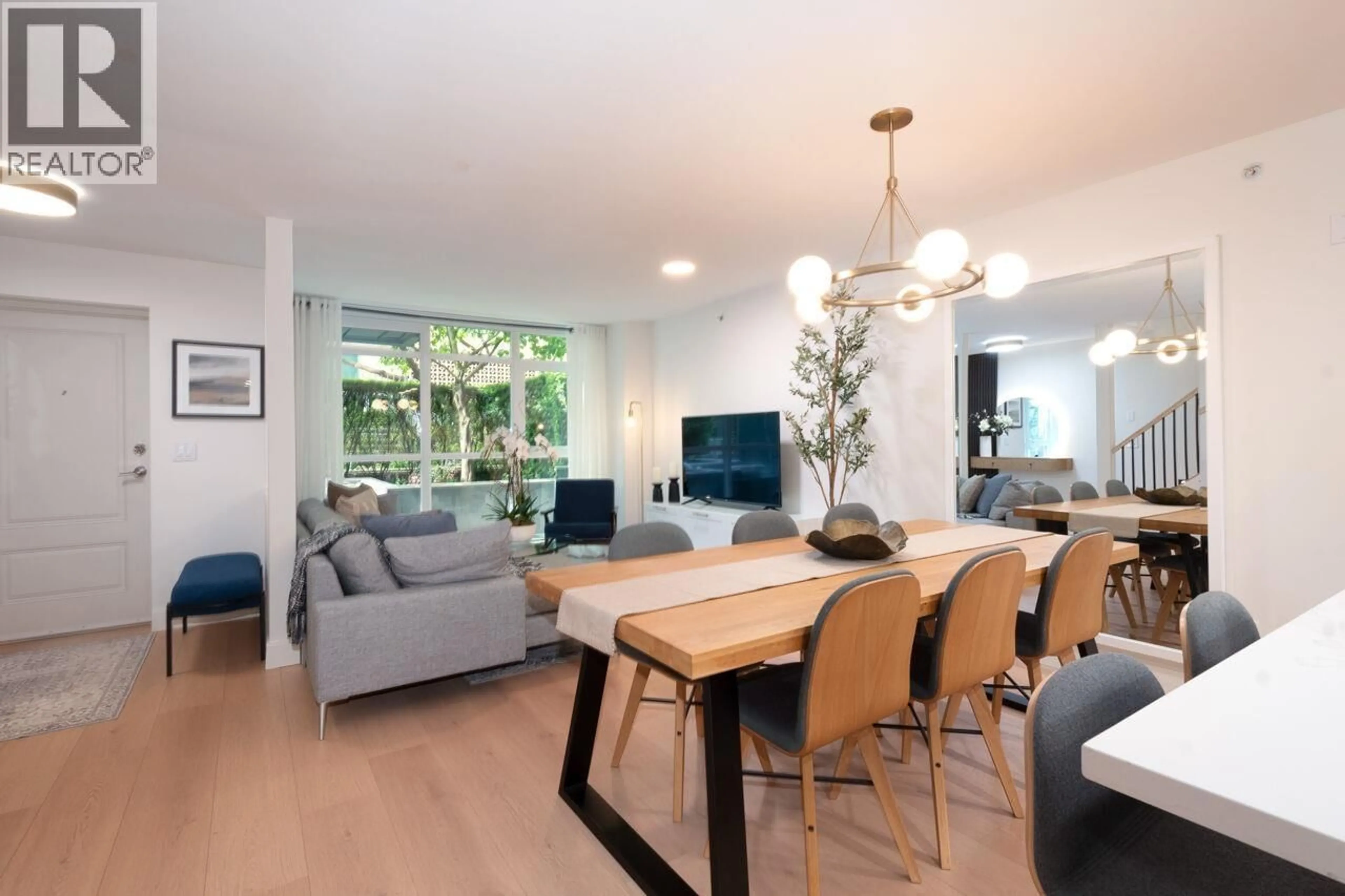 Living room with furniture, wood/laminate floor for 103 - 1133 HOMER STREET, Vancouver British Columbia V6B0B1
