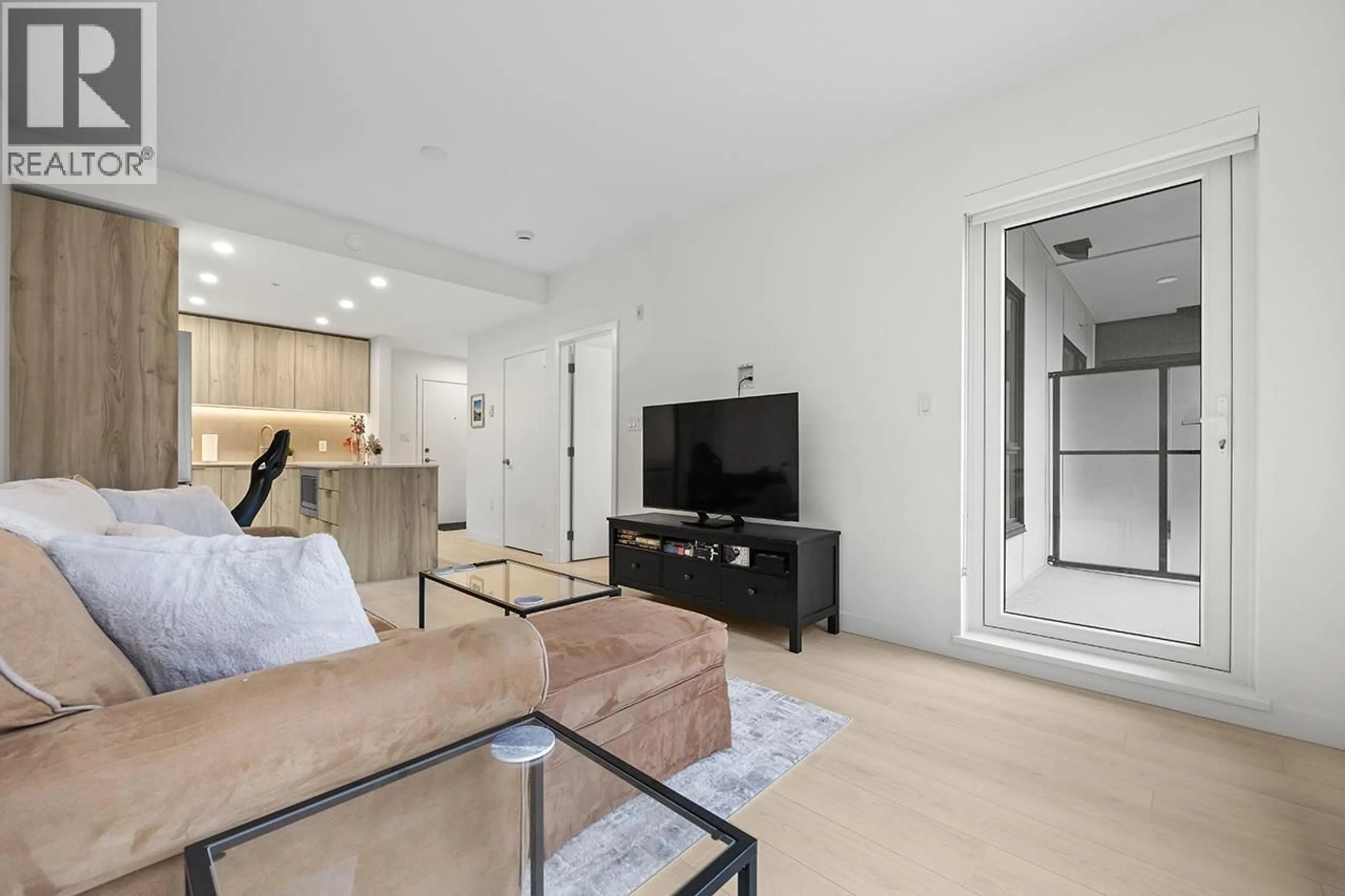 Living room with furniture, unknown for 303 - 3596 MALSUM DRIVE, North Vancouver British Columbia V7G0B5