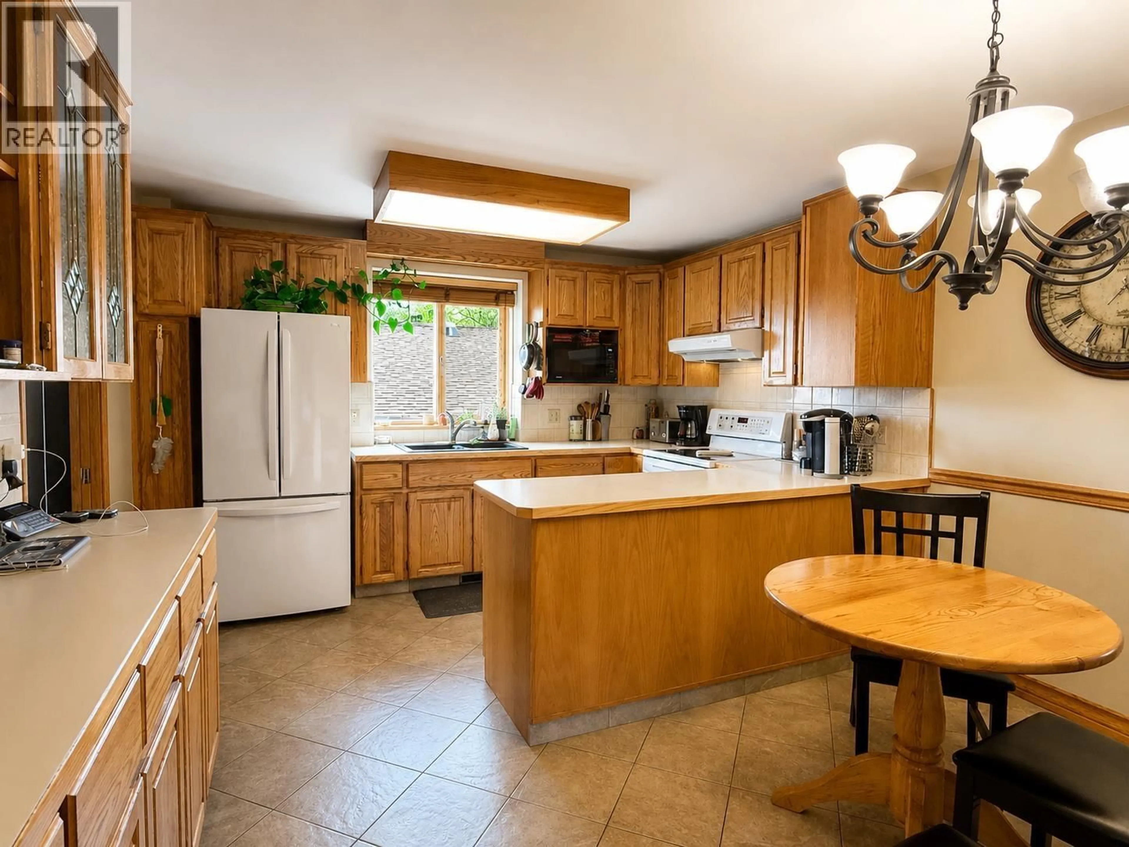 Standard kitchen, ceramic/tile floor for 785 IRWIN STREET, Prince George British Columbia V2M2X6