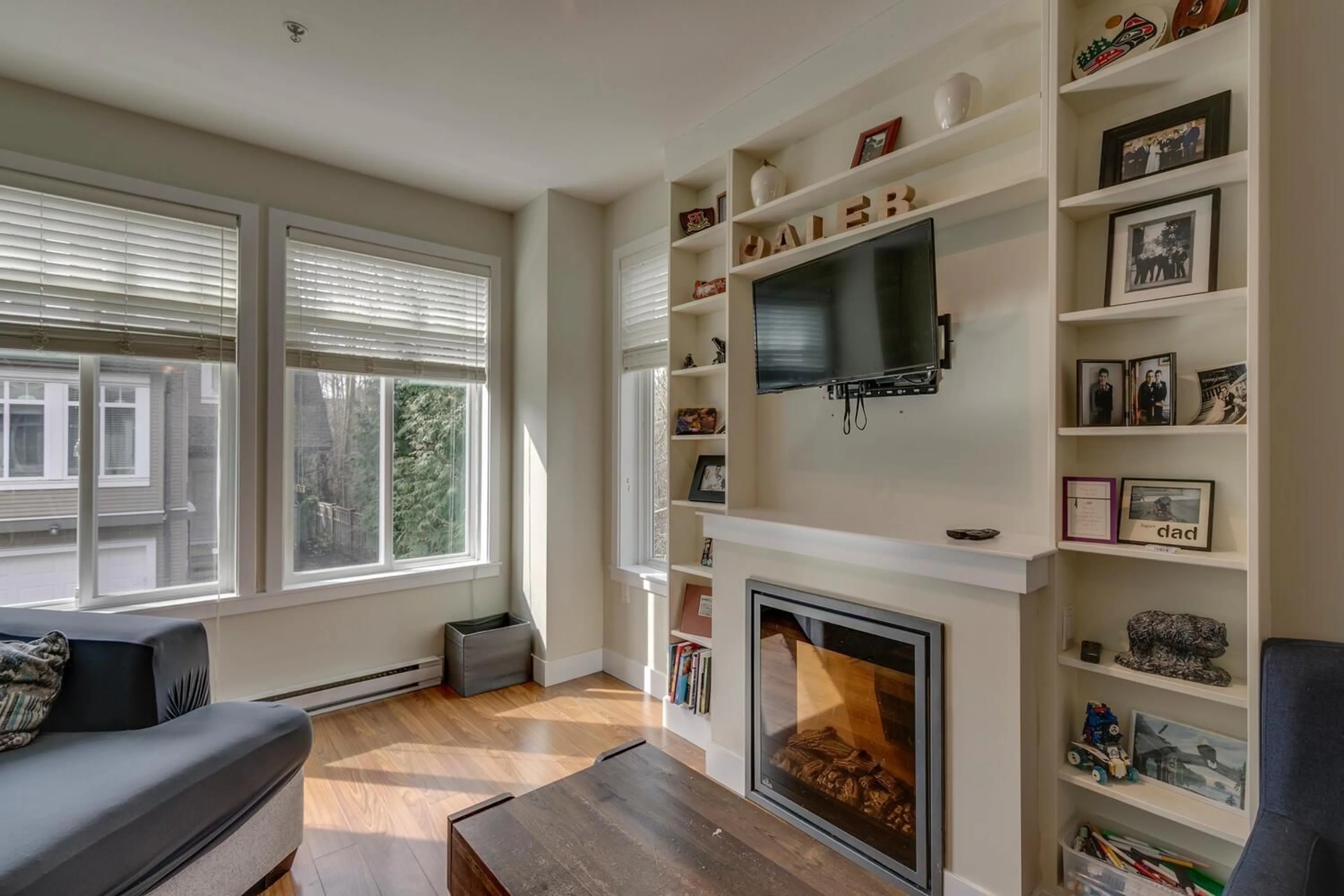 Living room with furniture, wood/laminate floor for 34 - 8250 209B STREET, Langley British Columbia V2Y0J7