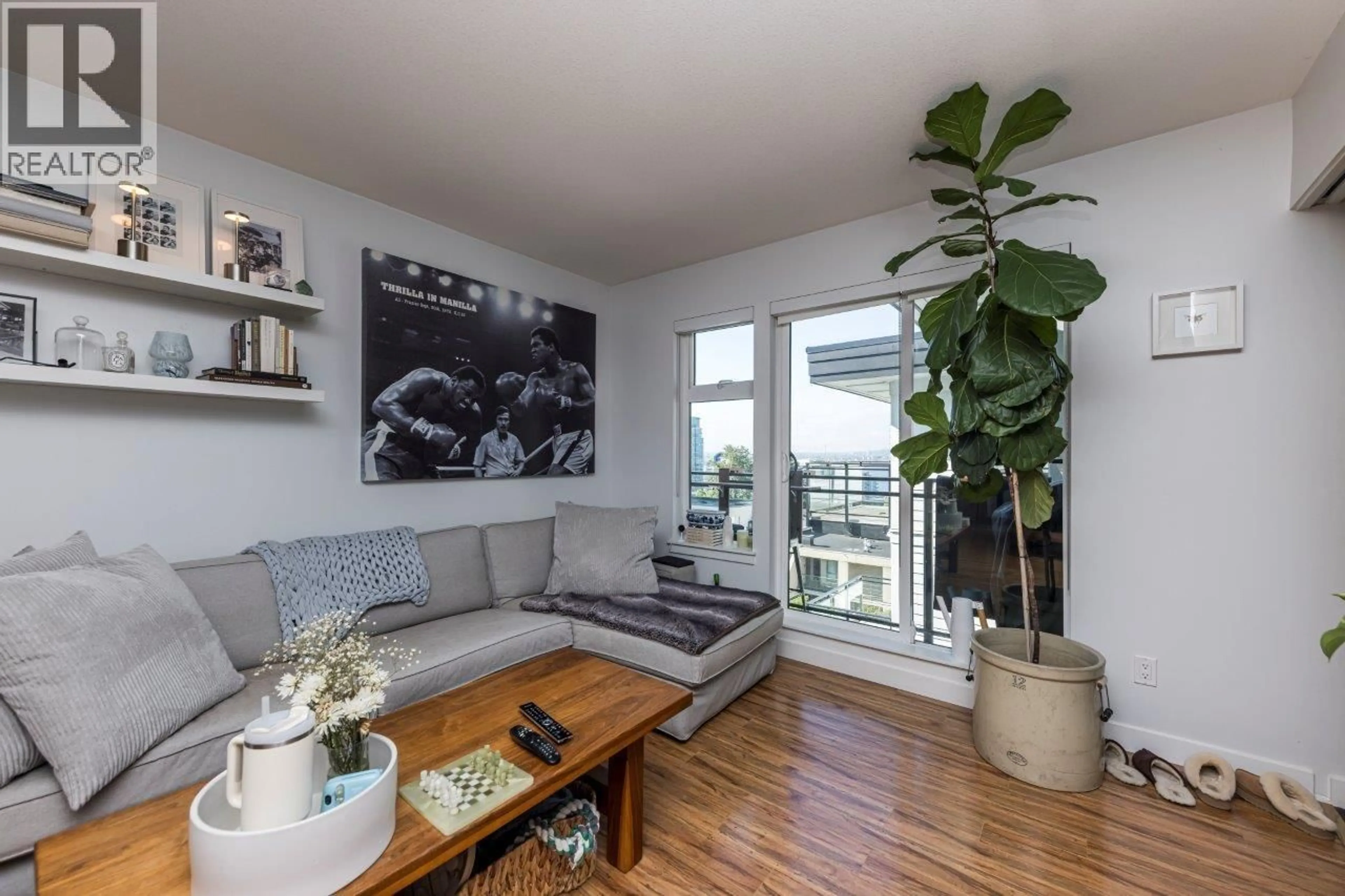 Living room with furniture, wood/laminate floor for 514 - 111 3RD STREET, North Vancouver British Columbia V7L0C6
