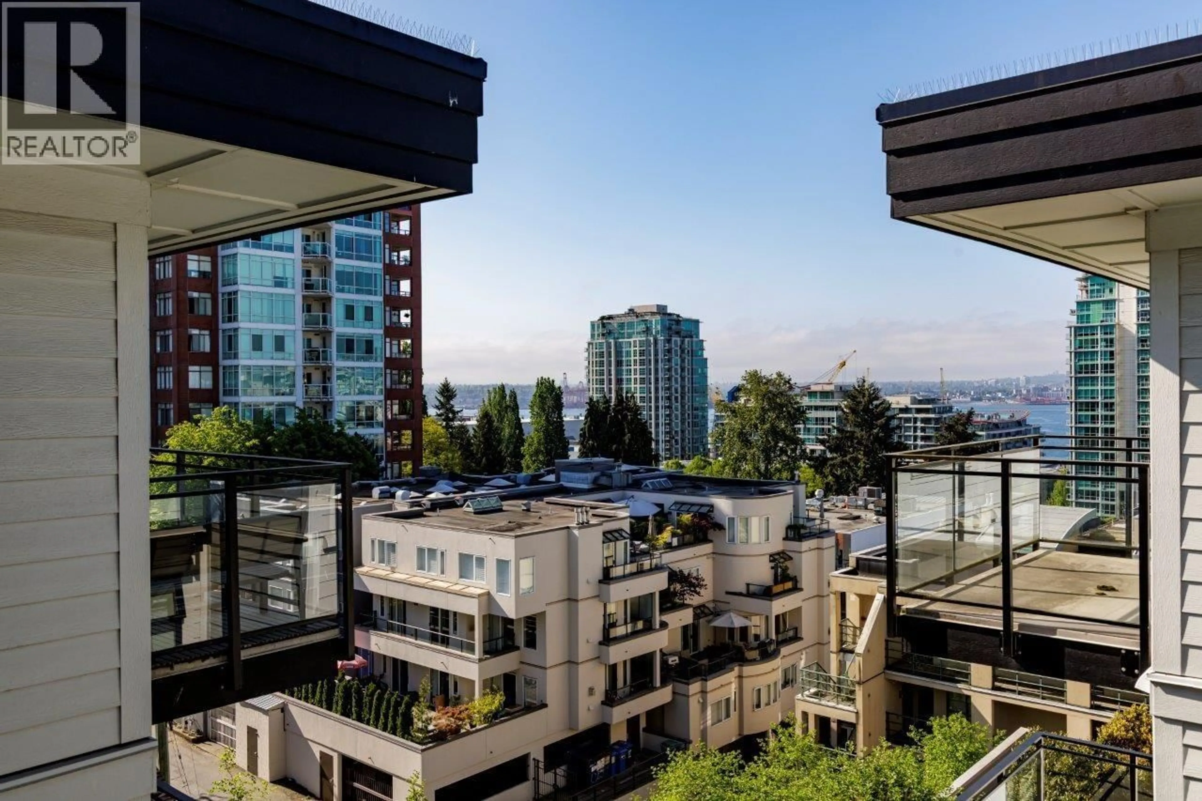 Patio, city buildings view from balcony for 514 - 111 3RD STREET, North Vancouver British Columbia V7L0C6
