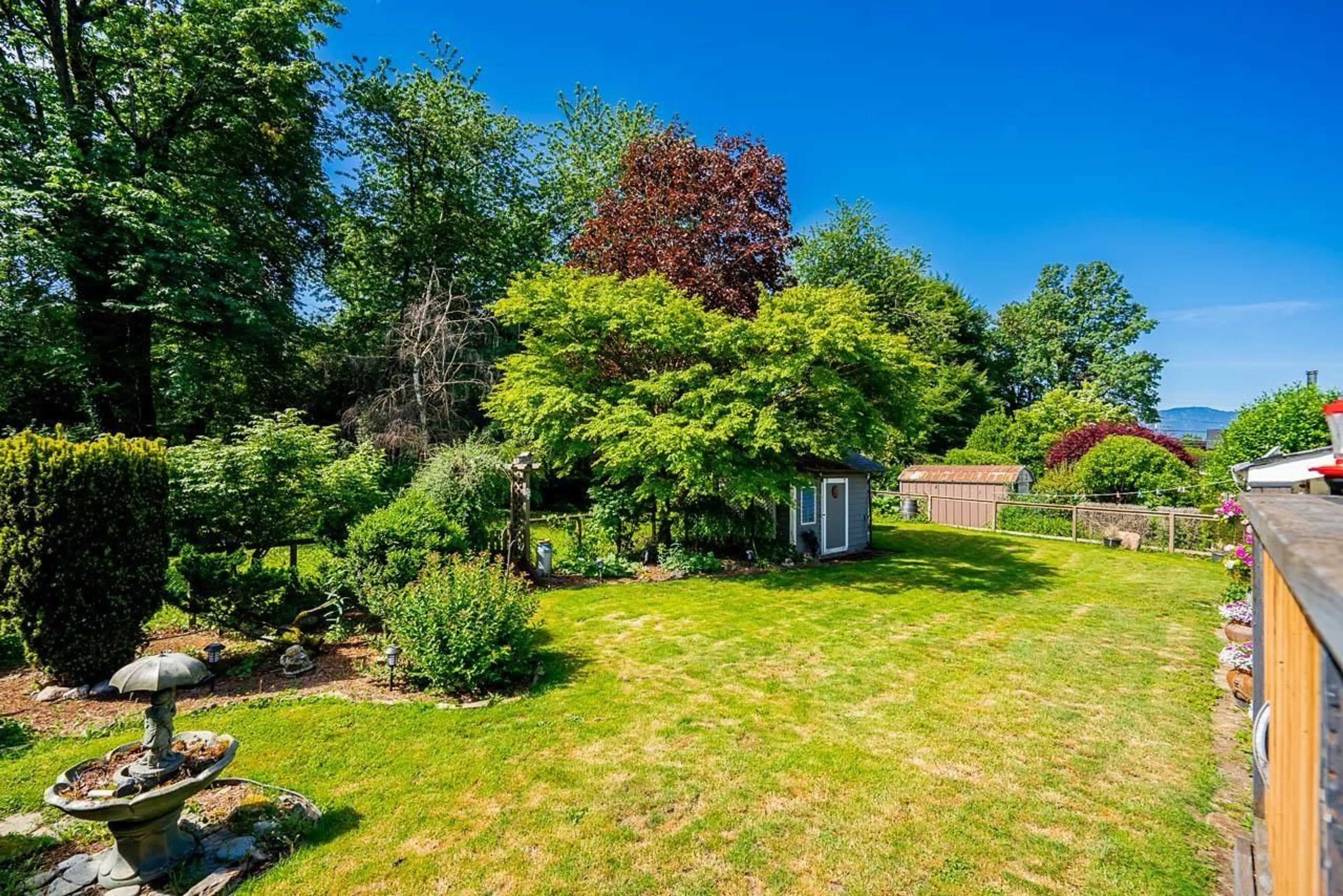 A pic from outside/outdoor area/front of a property/back of a property/a pic from drone, forest/trees view for 46070 ROY AVENUE, Chilliwack British Columbia V2R2C2