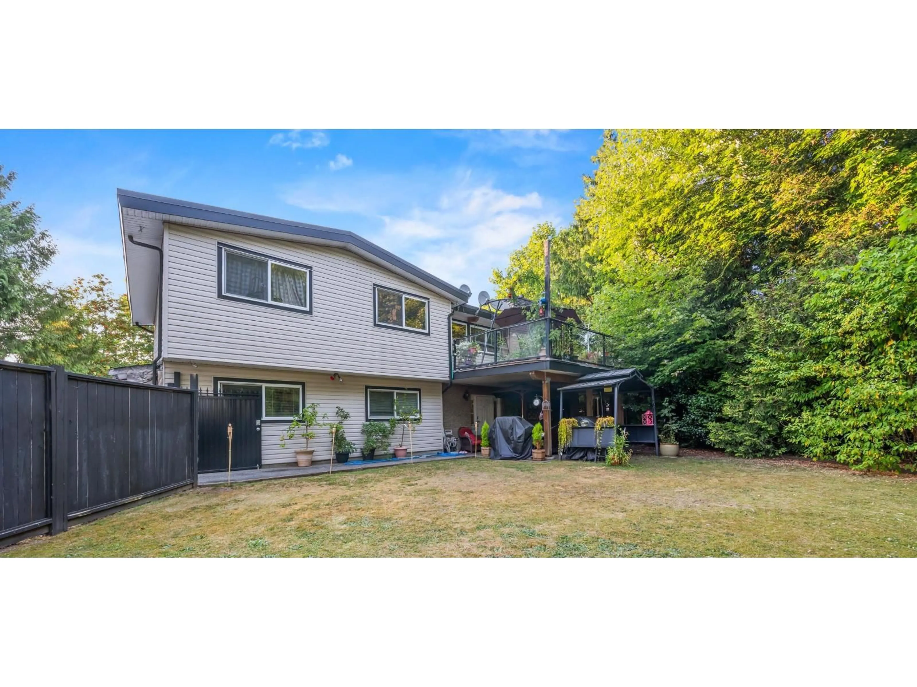 A pic from outside/outdoor area/front of a property/back of a property/a pic from drone, street for 15797 92 AVENUE, Surrey British Columbia V4N3C3