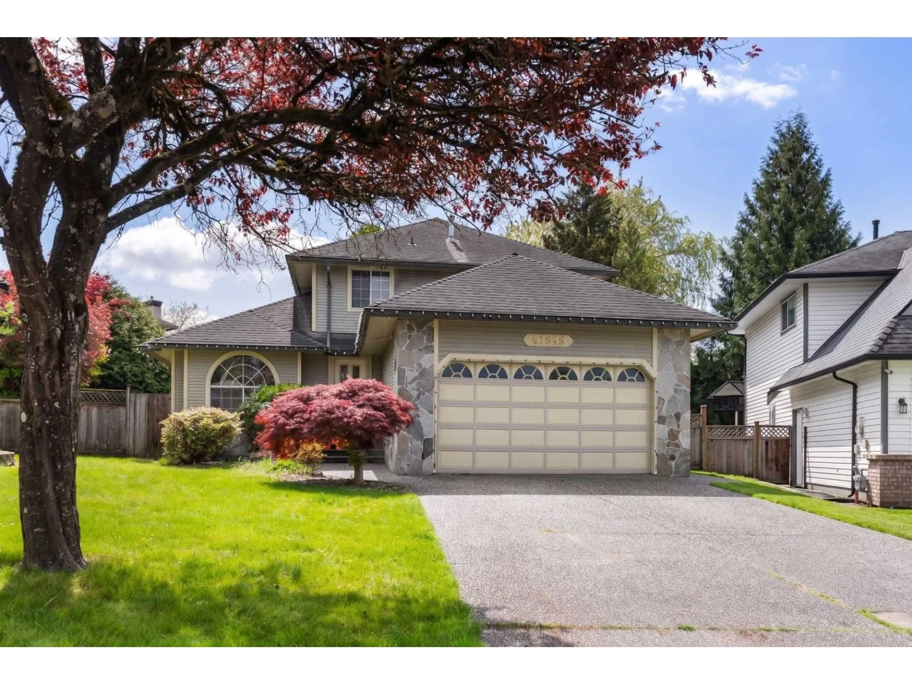 Home with vinyl exterior material, street for 21549 85B COURT, Langley British Columbia V1M2G4