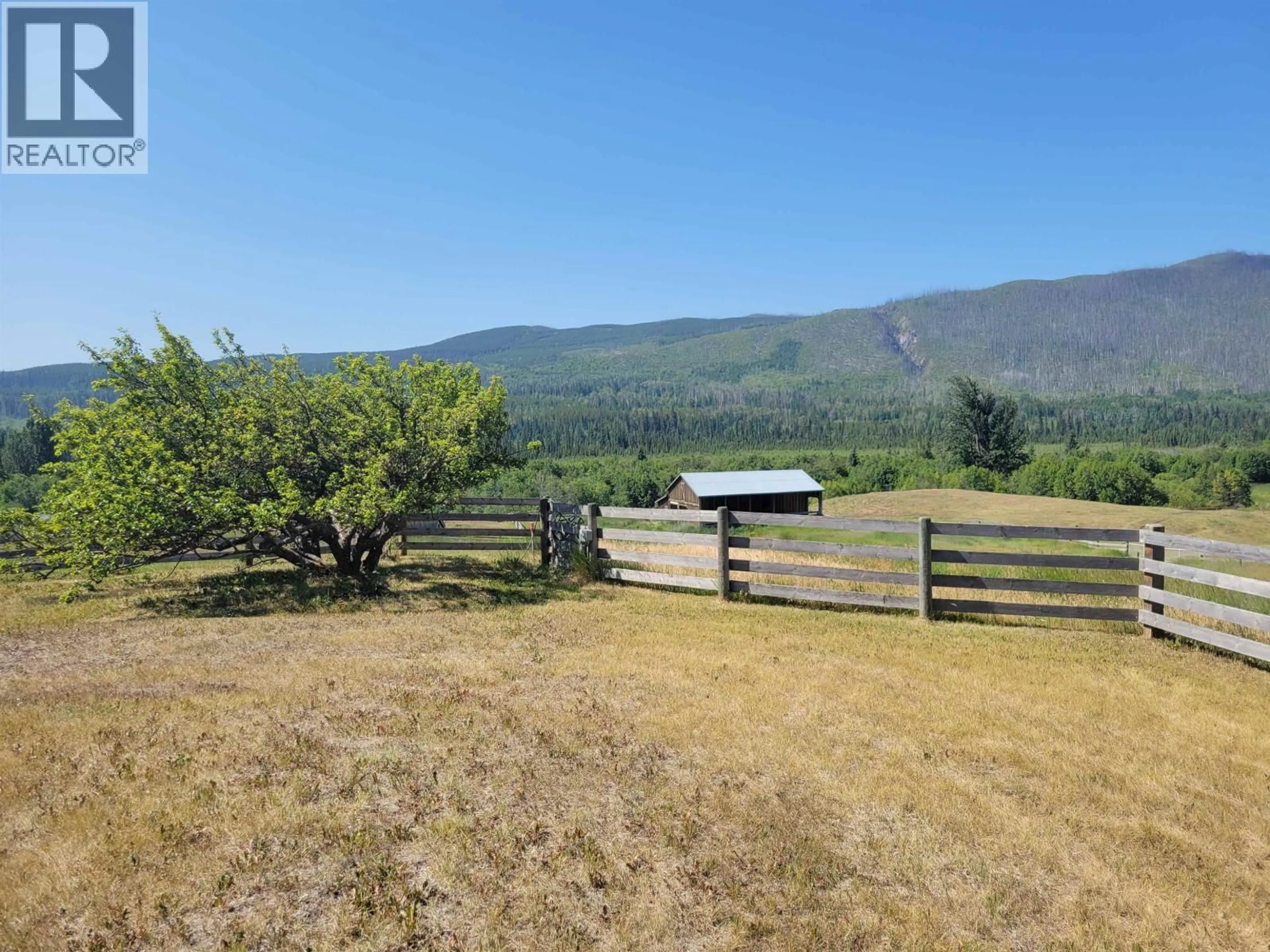 A pic from outside/outdoor area/front of a property/back of a property/a pic from drone, mountain view for 10443 NITHI PIT ROAD, Fraser Lake British Columbia V0J1S0