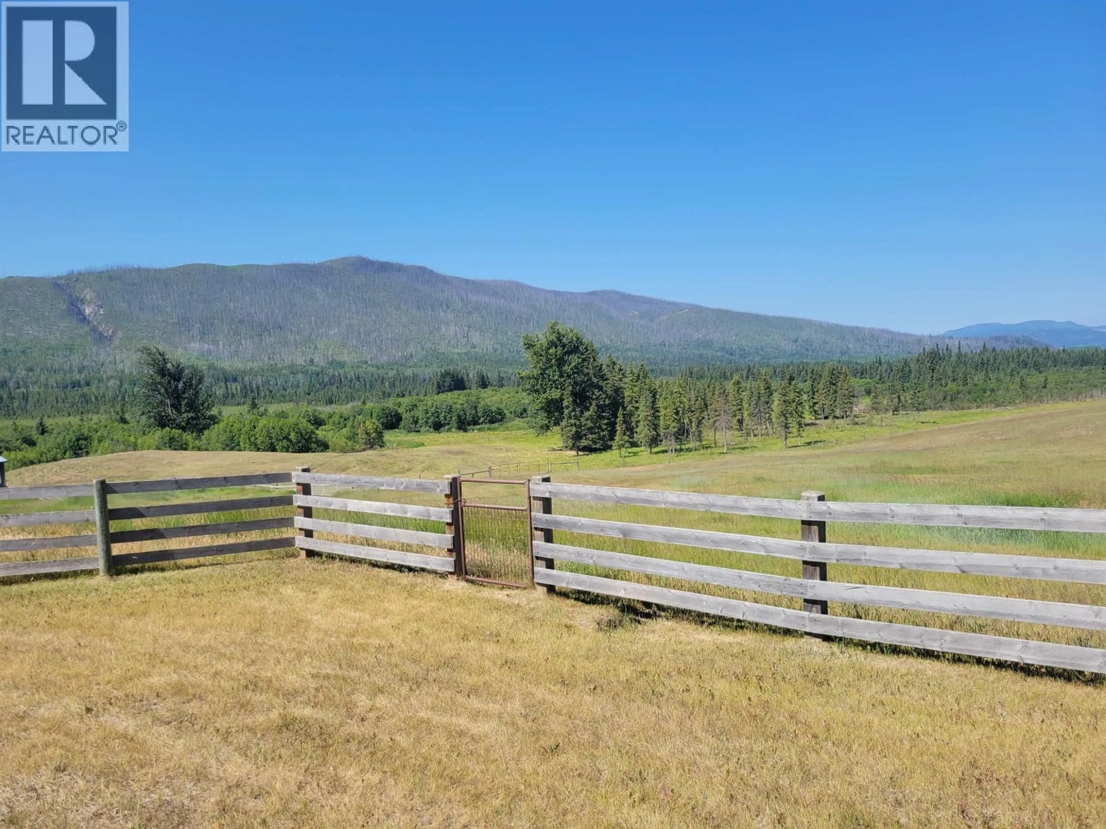 A pic from outside/outdoor area/front of a property/back of a property/a pic from drone, mountain view for 10443 NITHI PIT ROAD, Fraser Lake British Columbia V0J1S0