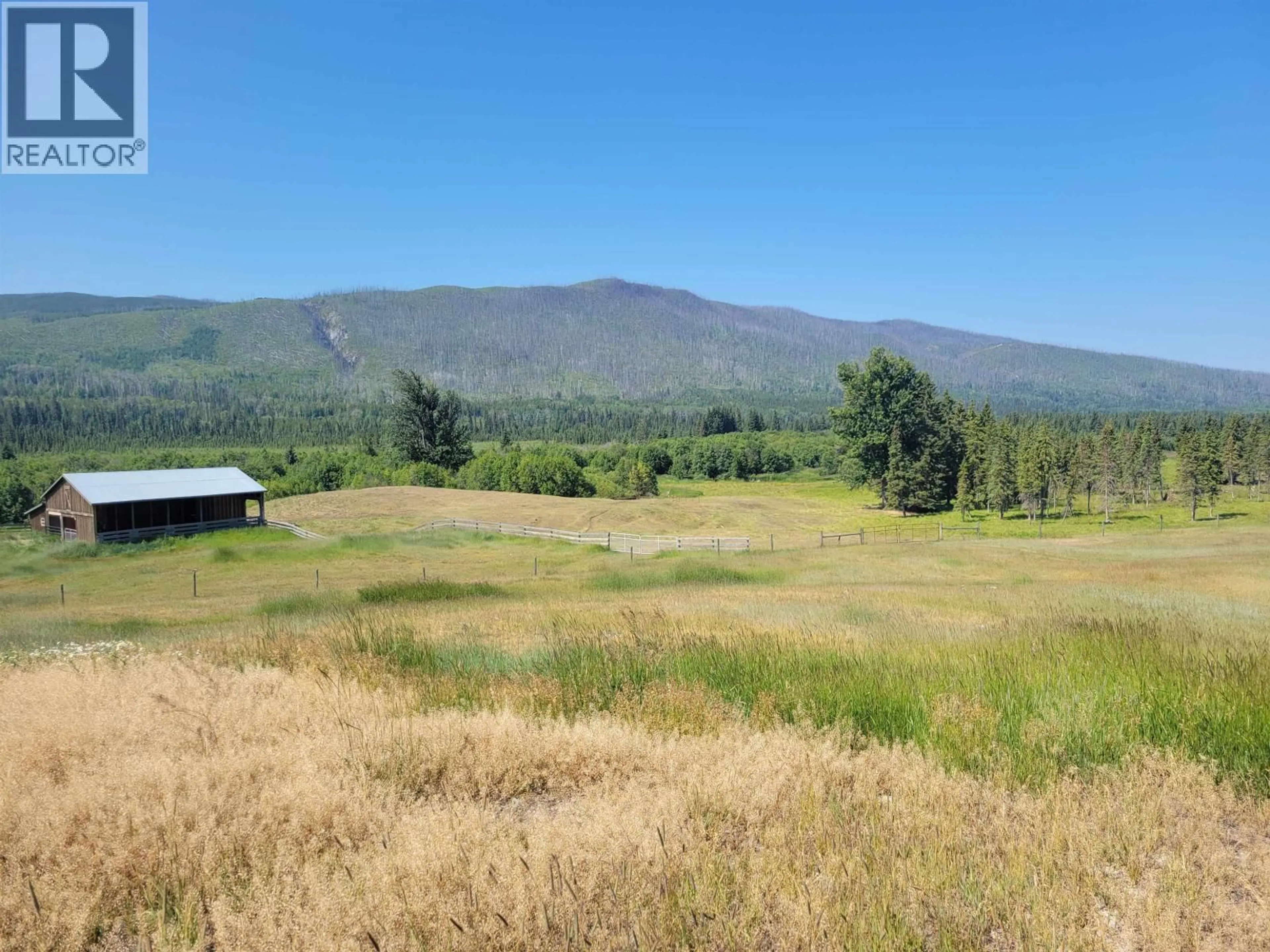A pic from outside/outdoor area/front of a property/back of a property/a pic from drone, mountain view for 10443 NITHI PIT ROAD, Fraser Lake British Columbia V0J1S0
