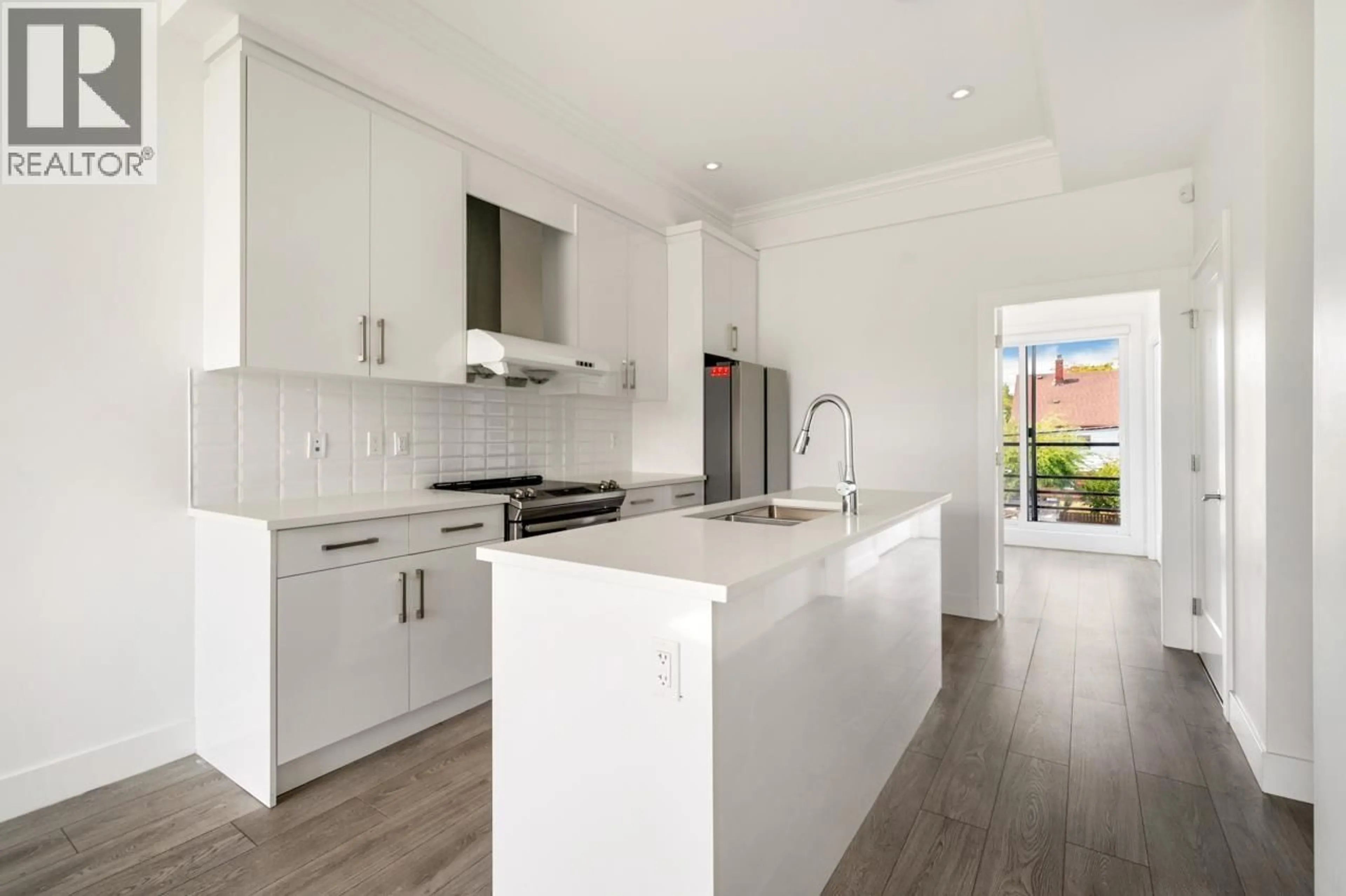 Open concept kitchen, unknown for 5043 CHAMBERS STREET, Vancouver British Columbia V5R3L8