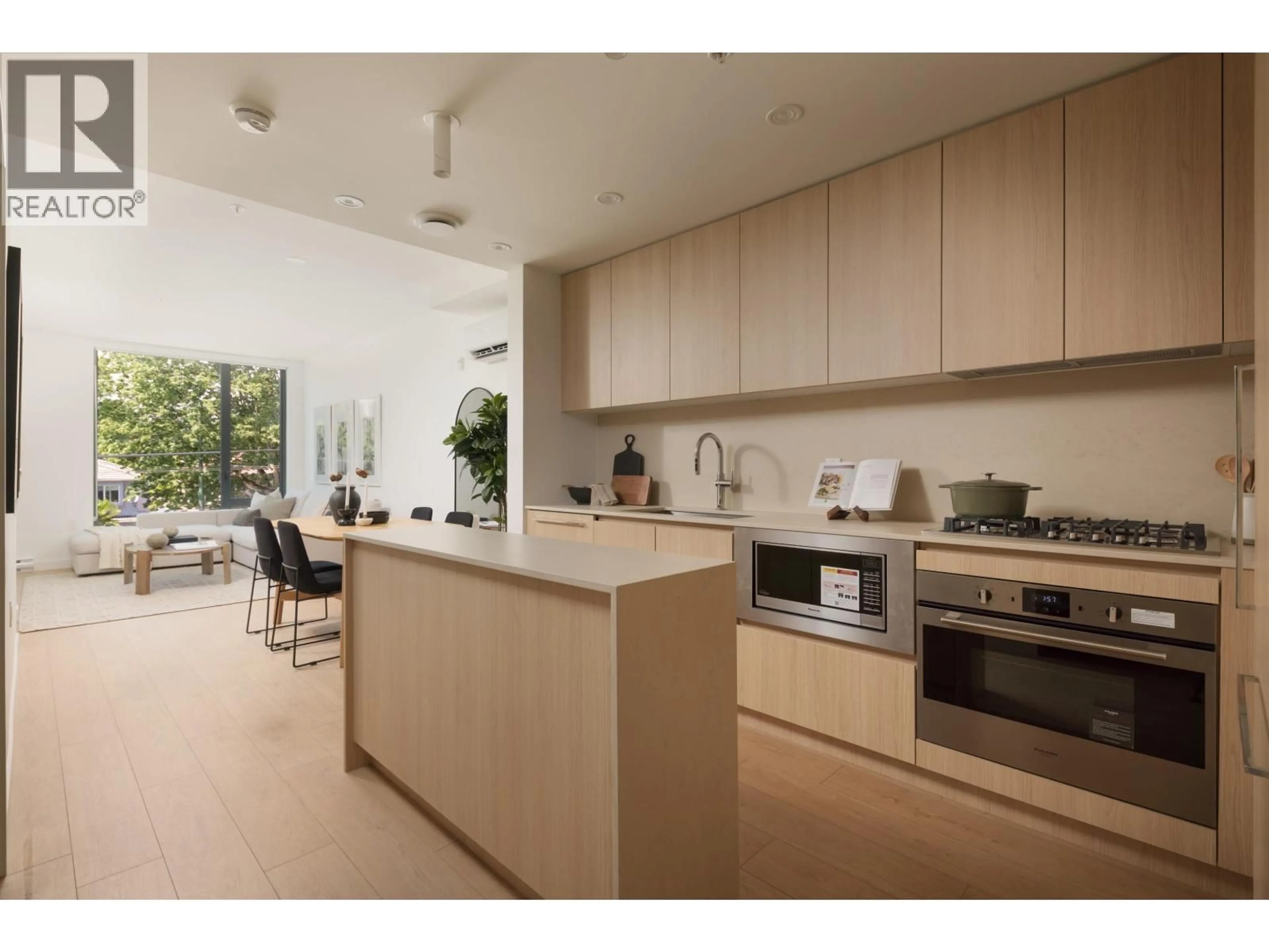 Open concept kitchen, unknown for 233 - 2830 NANAIMO STREET, Vancouver British Columbia V5N0E3