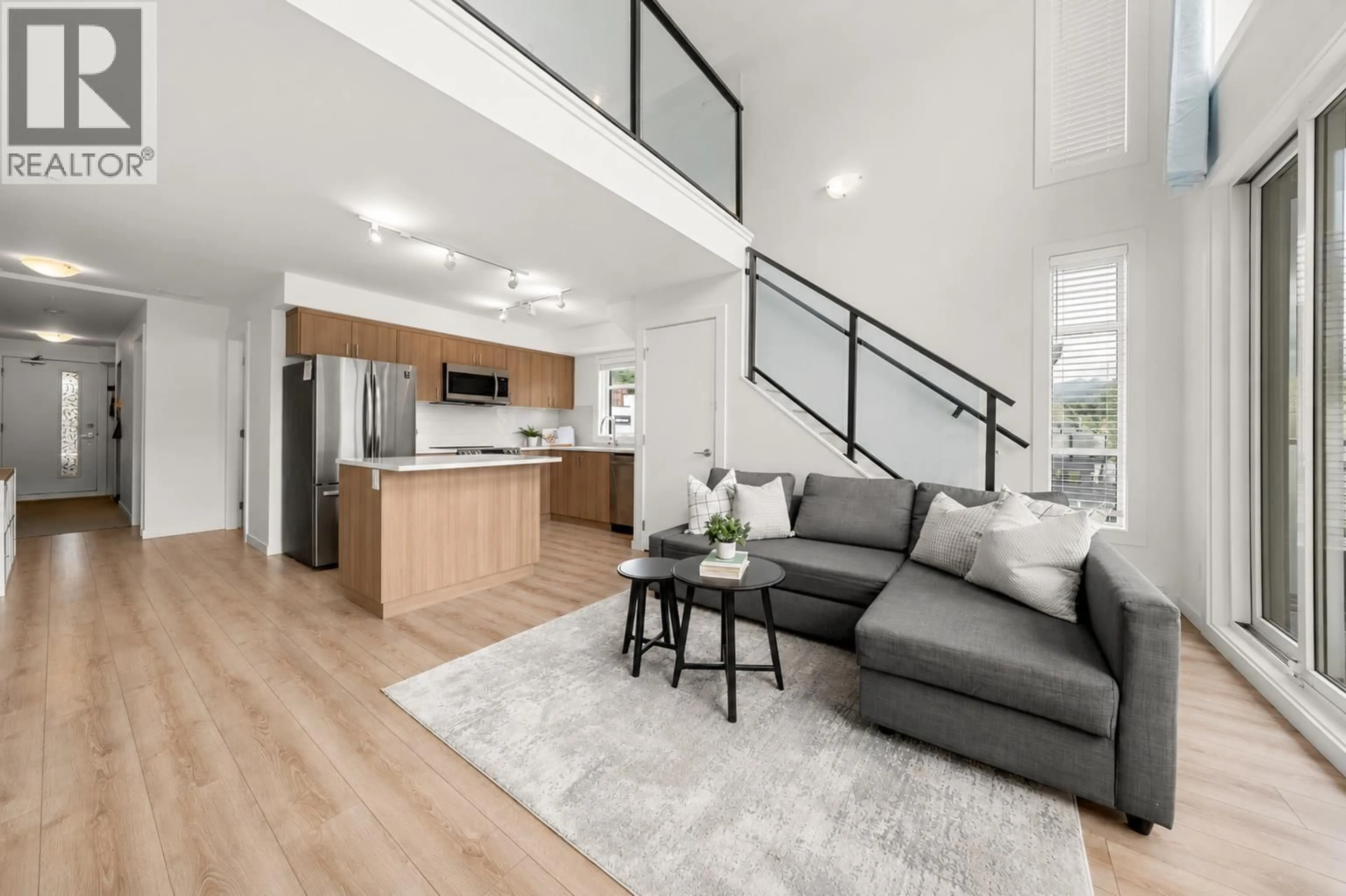 Living room with furniture, unknown for 206 - 39767 GOVERNMENT ROAD, Squamish British Columbia V8B0Z1