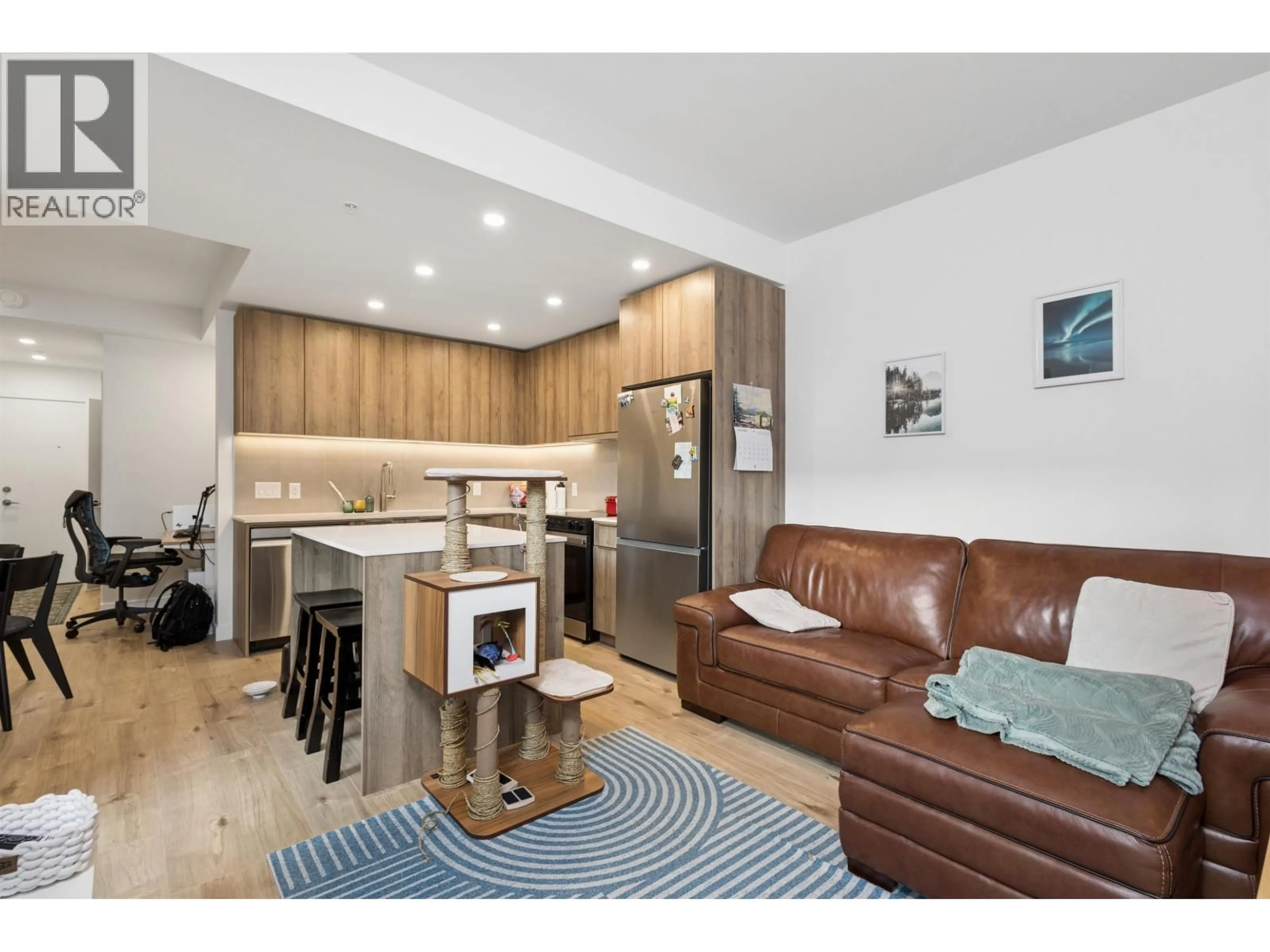 Open concept kitchen, wood/laminate floor for 204 - 3596 MALSUM DRIVE, North Vancouver British Columbia V7G0B5