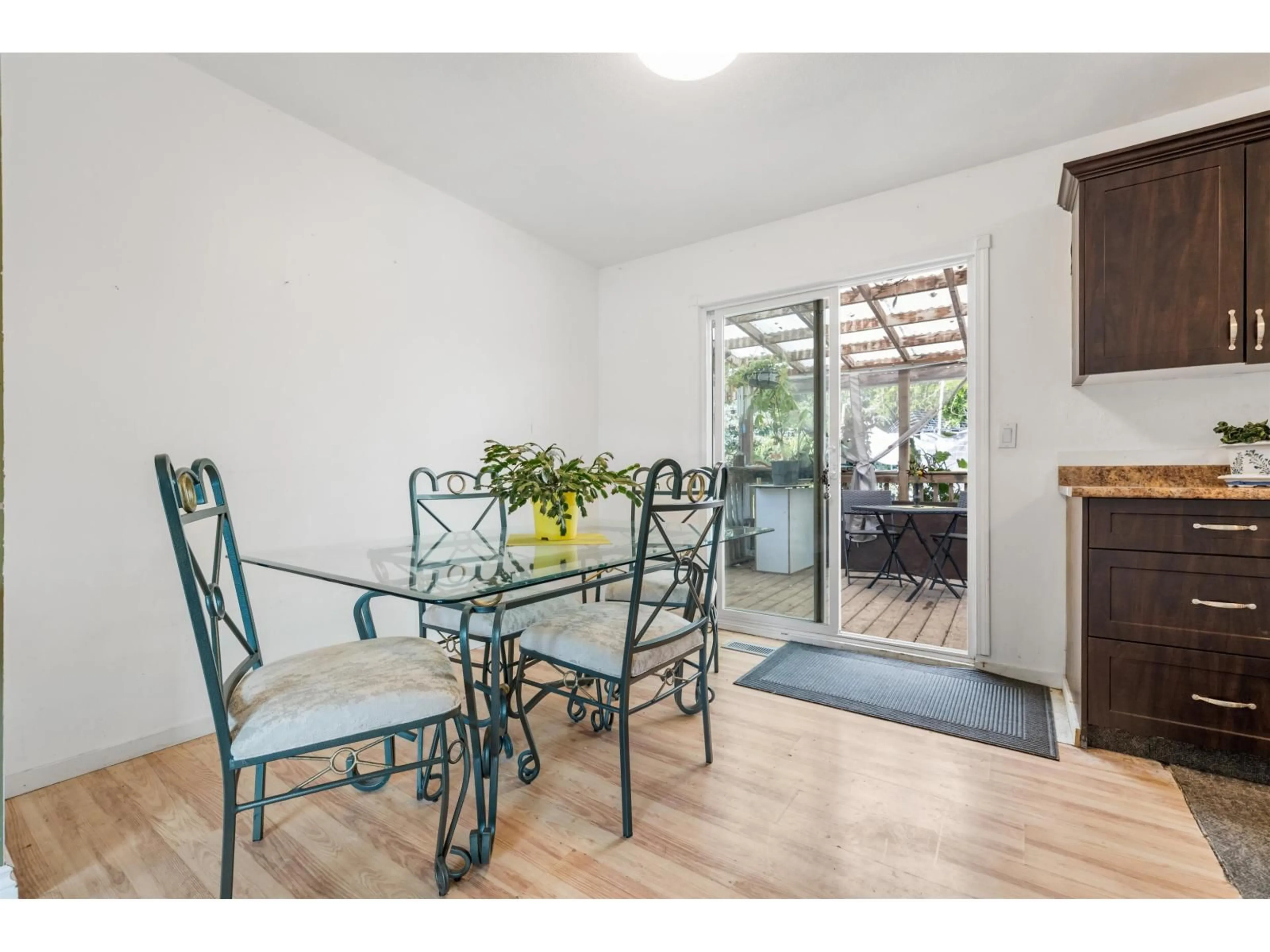 Dining room, wood/laminate floor for 35117 SKEENA AVENUE, Abbotsford British Columbia V2S7H5