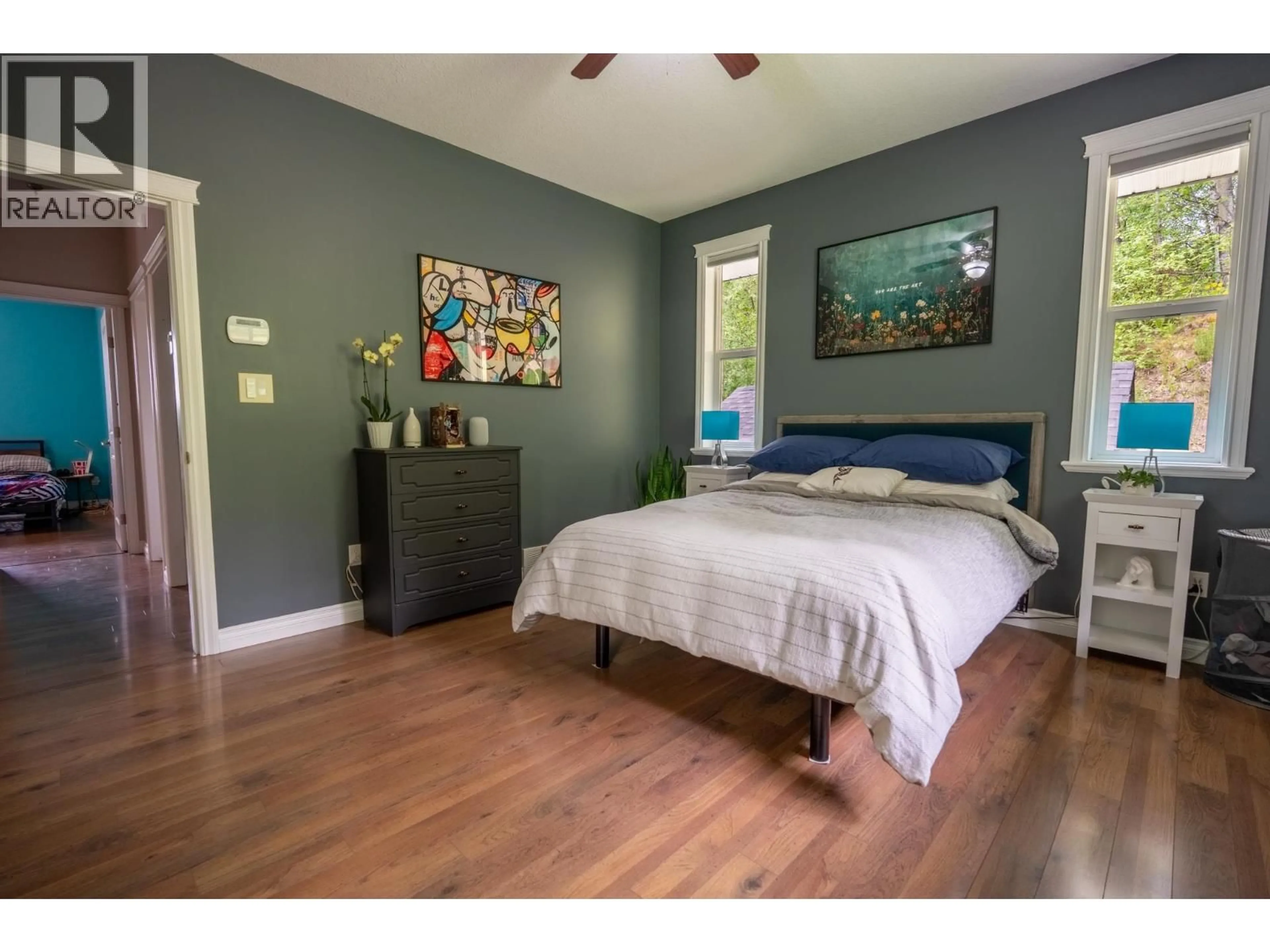Bedroom with bed, wood/laminate floor for 3065 CHARELLA PLACE, Prince George British Columbia V2N5L1
