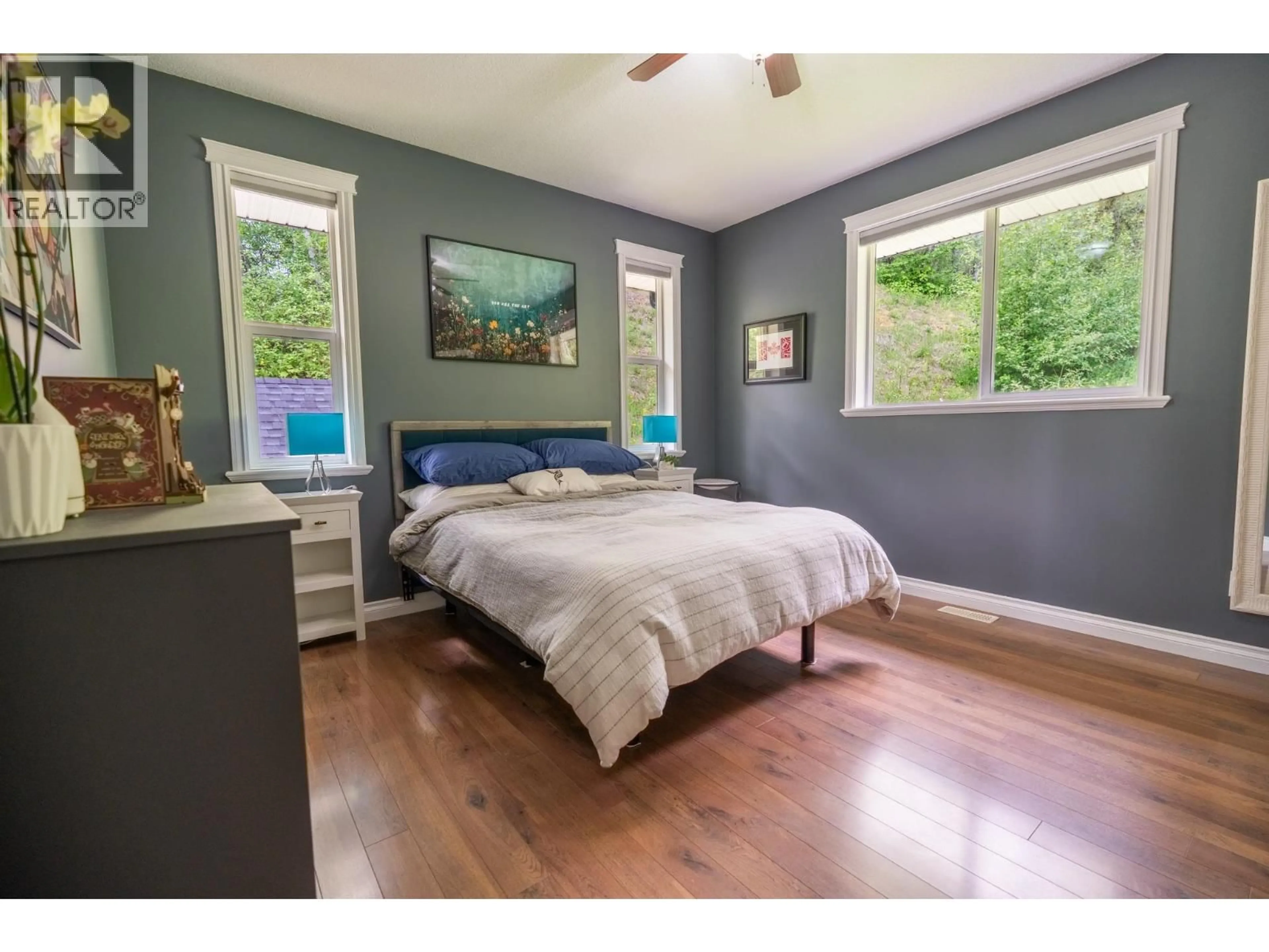 Bedroom with bed, wood/laminate floor for 3065 CHARELLA PLACE, Prince George British Columbia V2N5L1