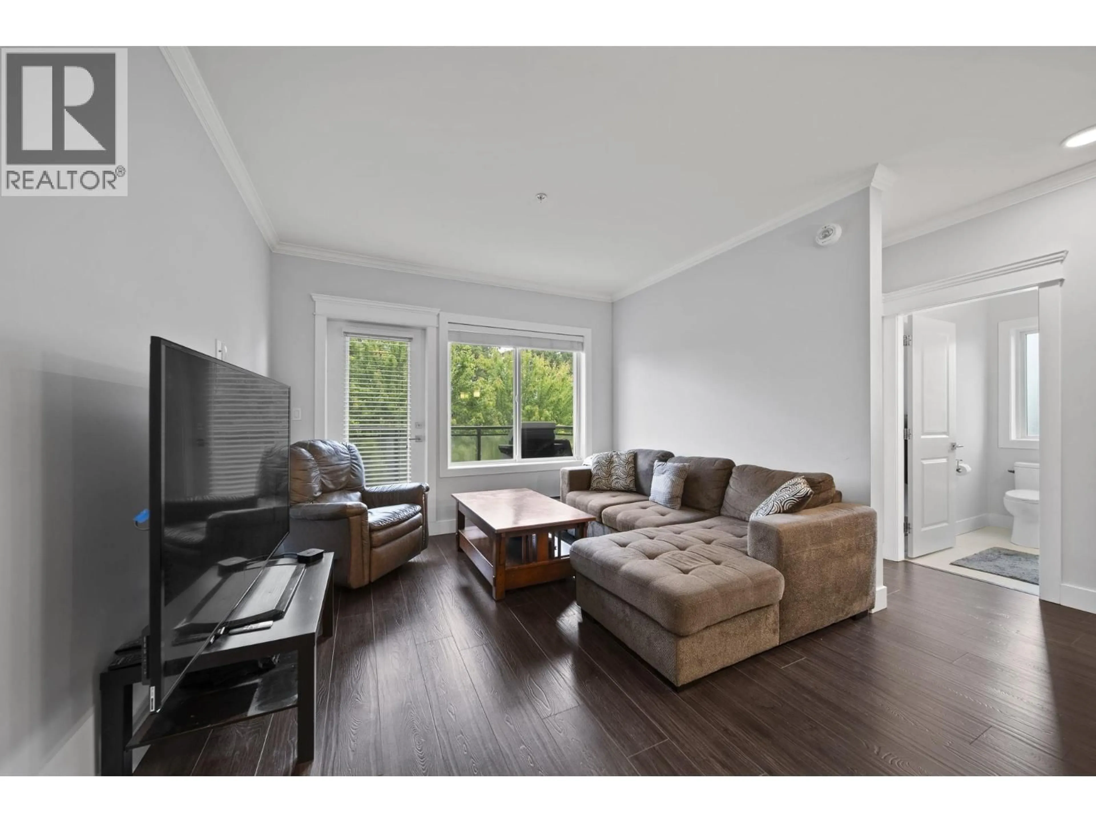 Living room with furniture, wood/laminate floor for 306 - 2229 ATKINS AVENUE, Port Coquitlam British Columbia V3C0H2