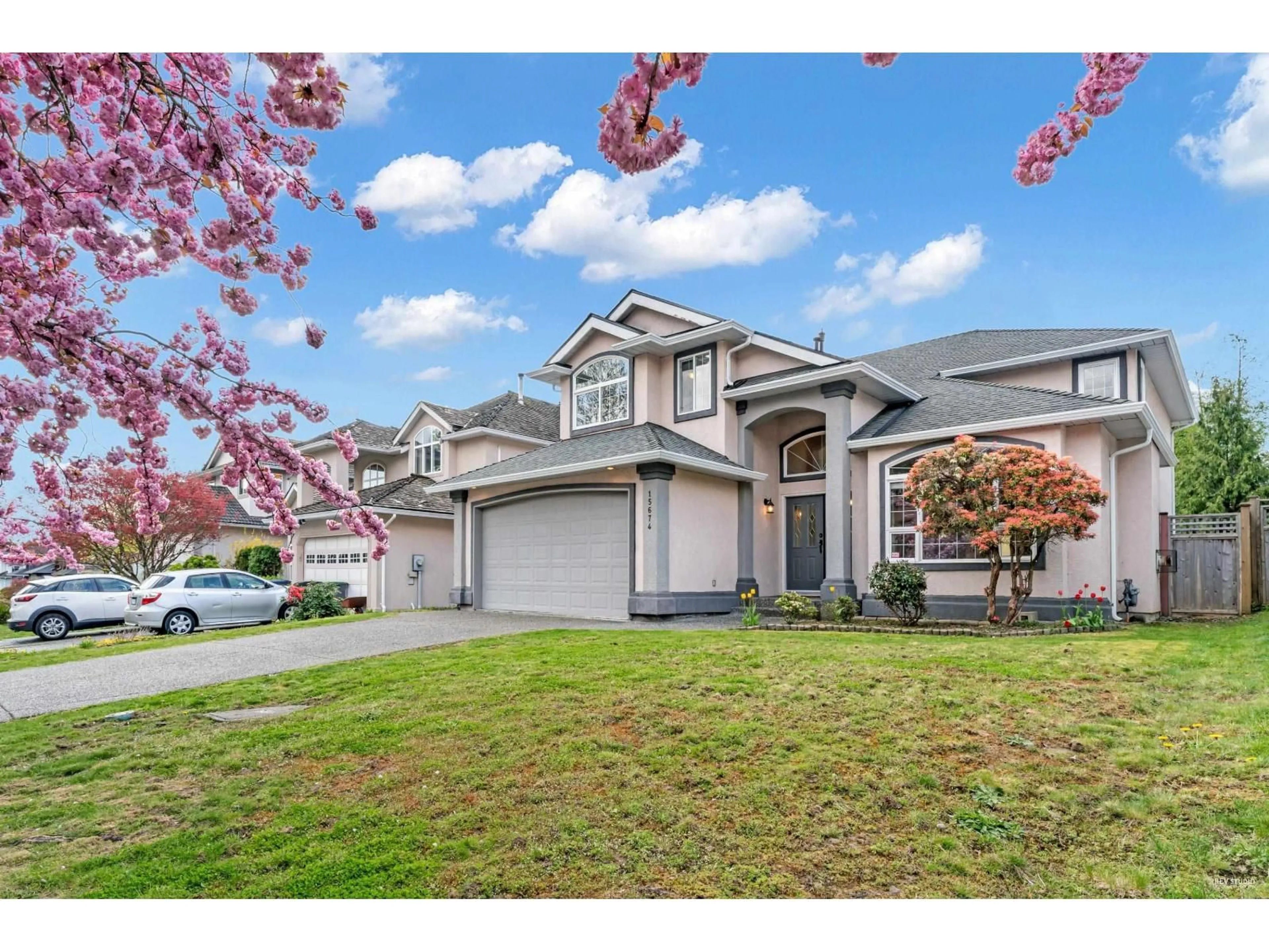 Home with vinyl exterior material, street for 15674 101A AVENUE, Surrey British Columbia V4N4S4