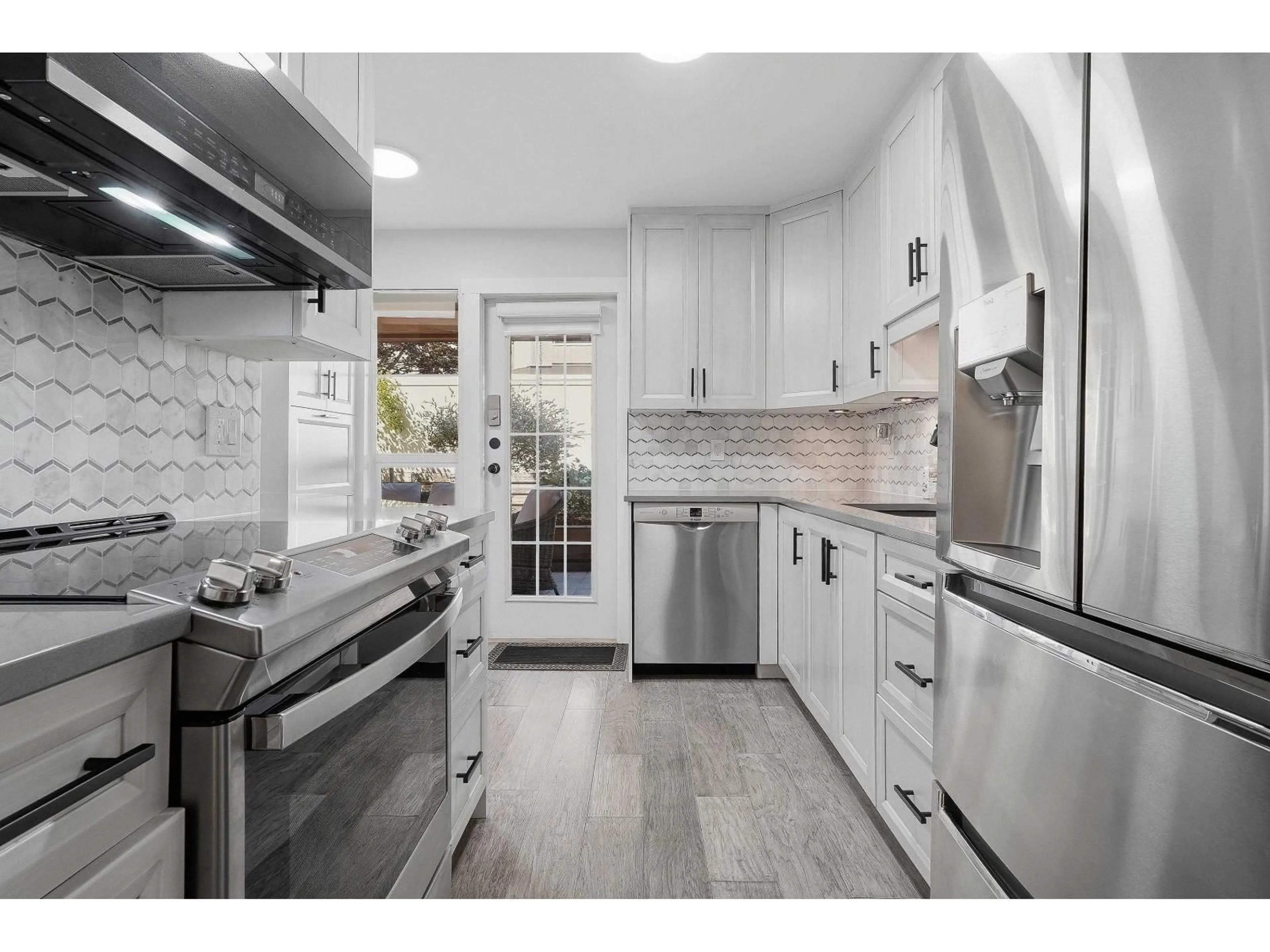 Open concept kitchen, unknown for 114 - 15155 22 AVENUE, Surrey British Columbia V4A9T4
