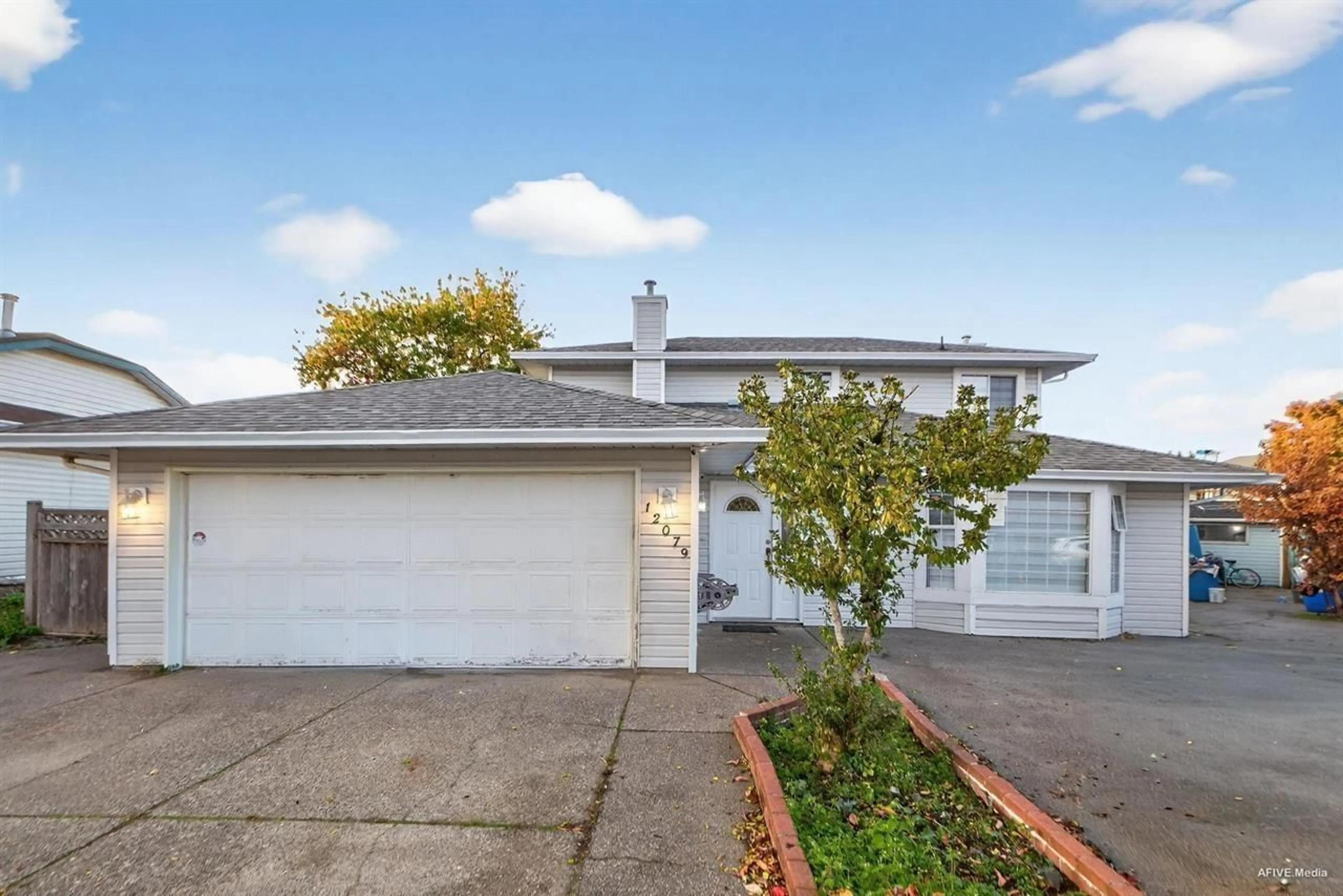 A pic from outside/outdoor area/front of a property/back of a property/a pic from drone, street for 12079 84A AVENUE, Surrey British Columbia V3W0S7
