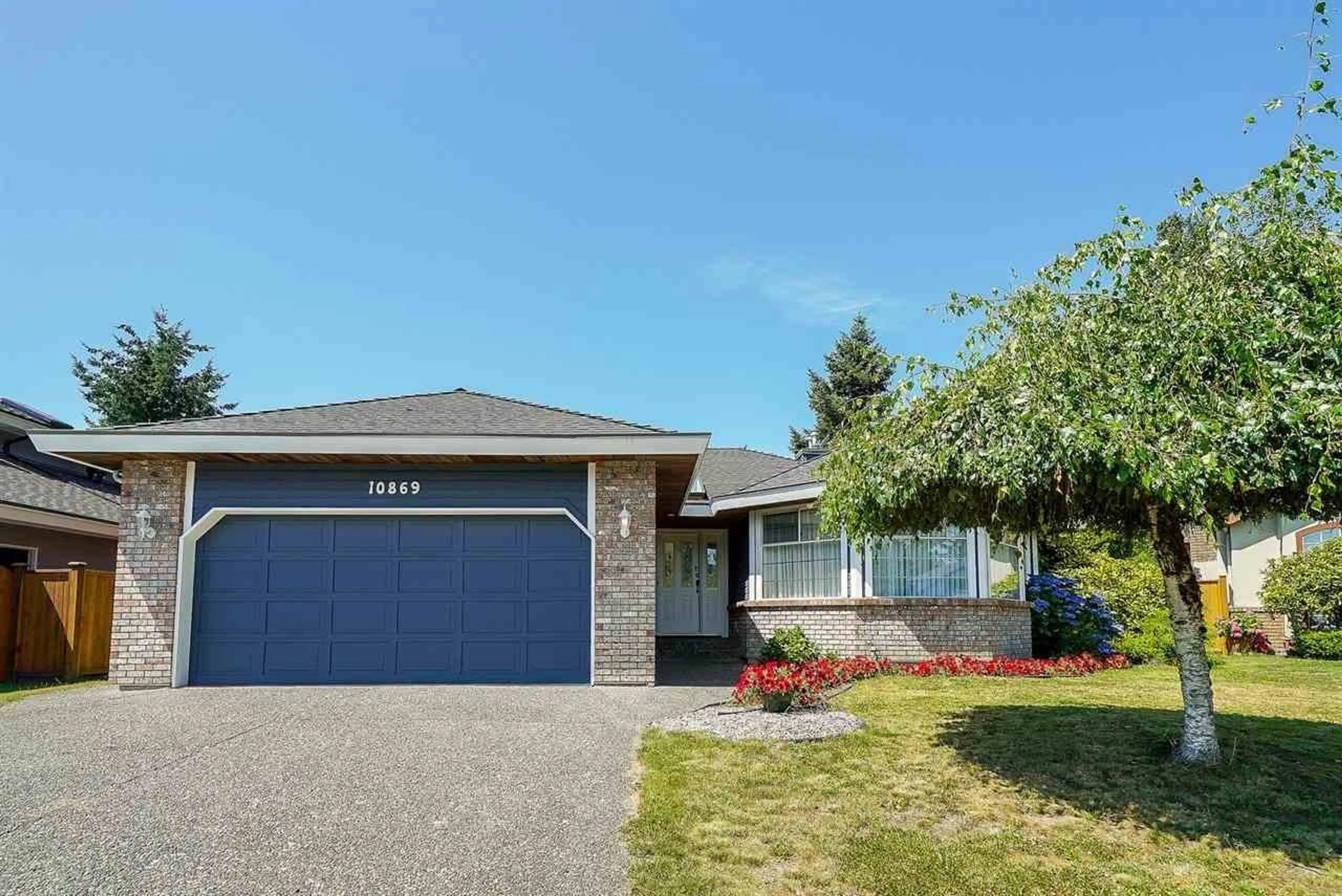 Home with vinyl exterior material, street for 10869 162B STREET, Surrey British Columbia V4N1N9