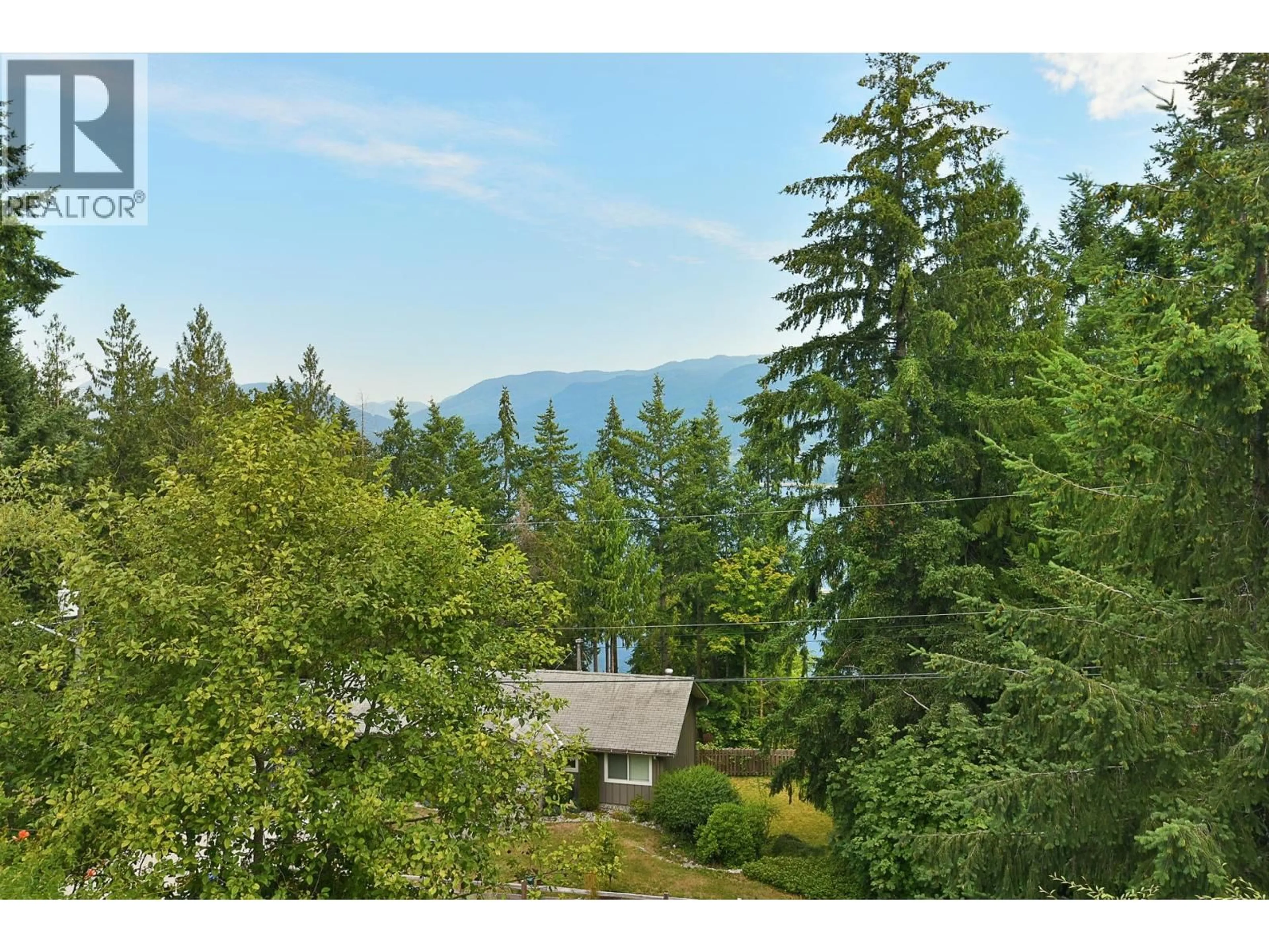 A pic from outside/outdoor area/front of a property/back of a property/a pic from drone, water/lake/river/ocean view for 5866D TURNSTONE CRESCENT, Sechelt British Columbia V7Z0L9