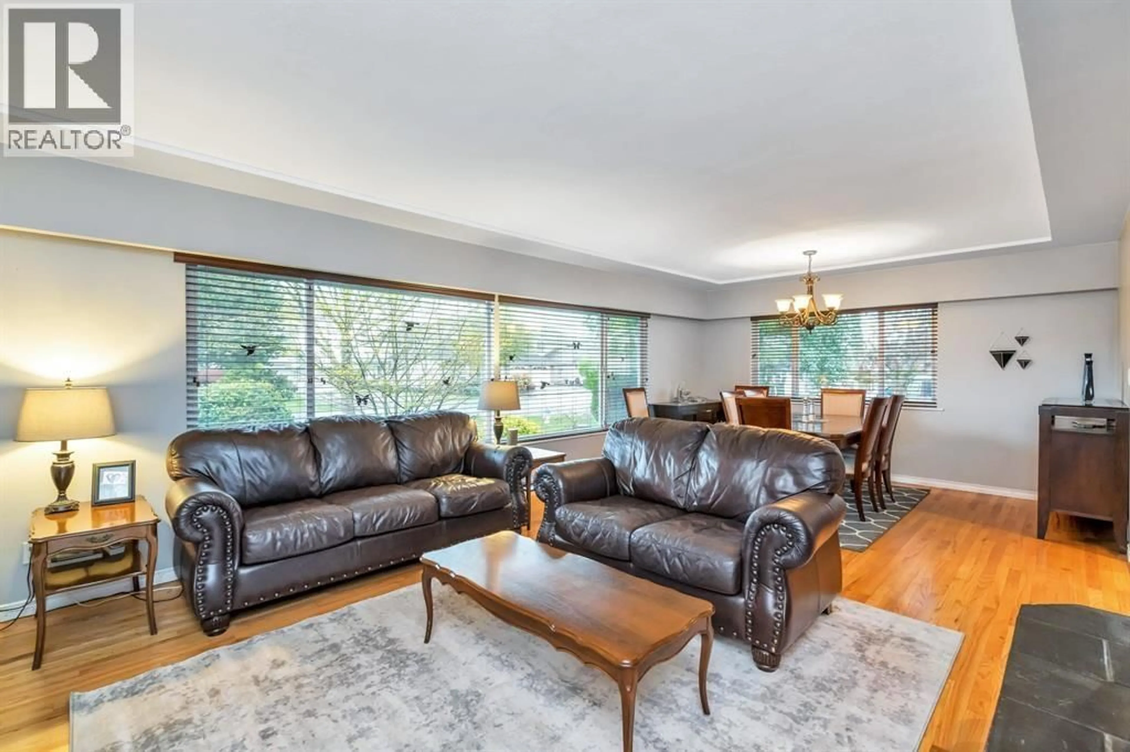 Living room with furniture, wood/laminate floor for 4729 60B STREET, Delta British Columbia V4K3K9