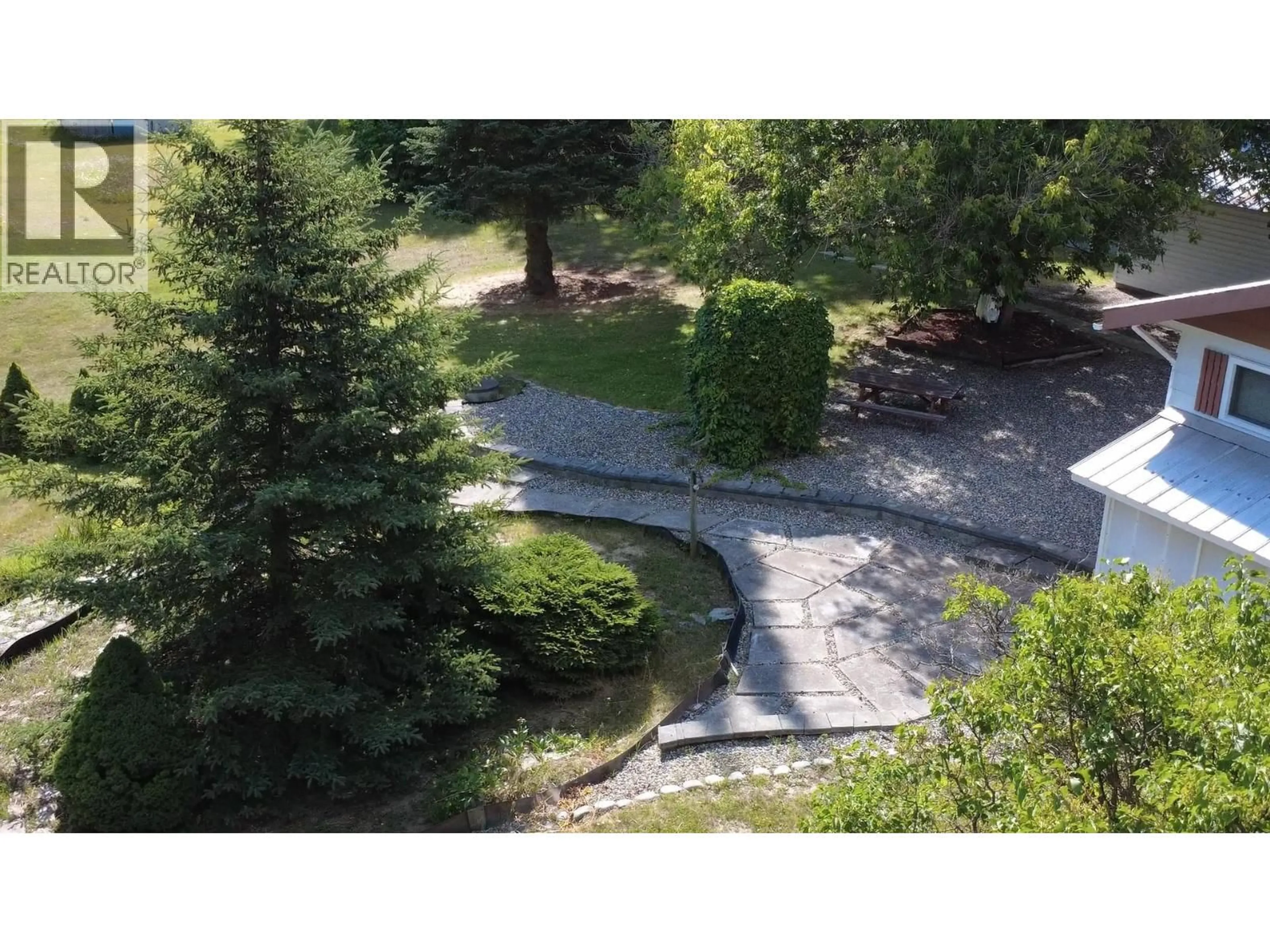A pic from outside/outdoor area/front of a property/back of a property/a pic from drone, forest/trees view for 4817 WHITE ROAD, Quesnel British Columbia V2J6L4