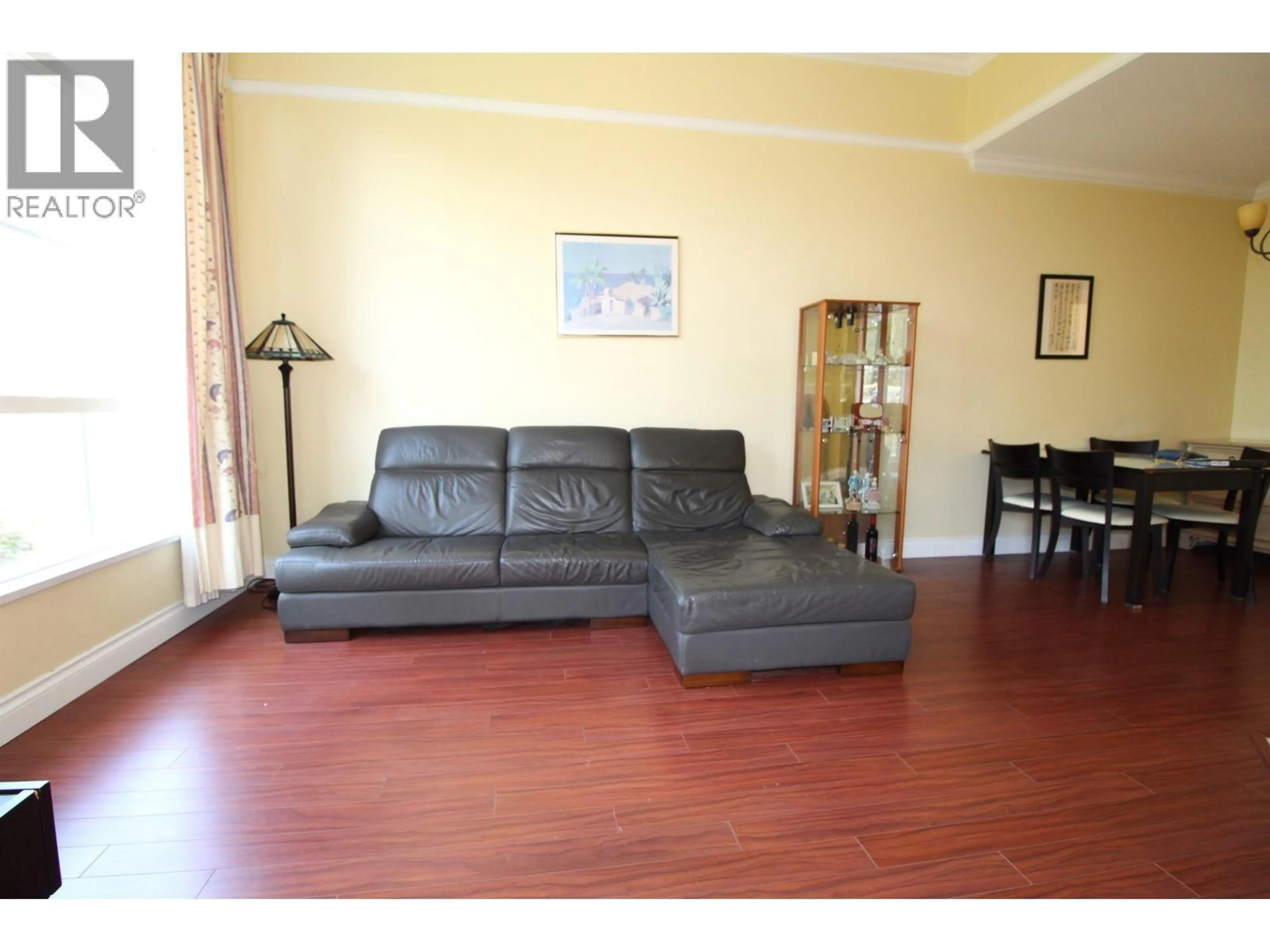 Living room with furniture, wood/laminate floor for 303 - 8975 JONES ROAD, Richmond British Columbia V6Y3Y7