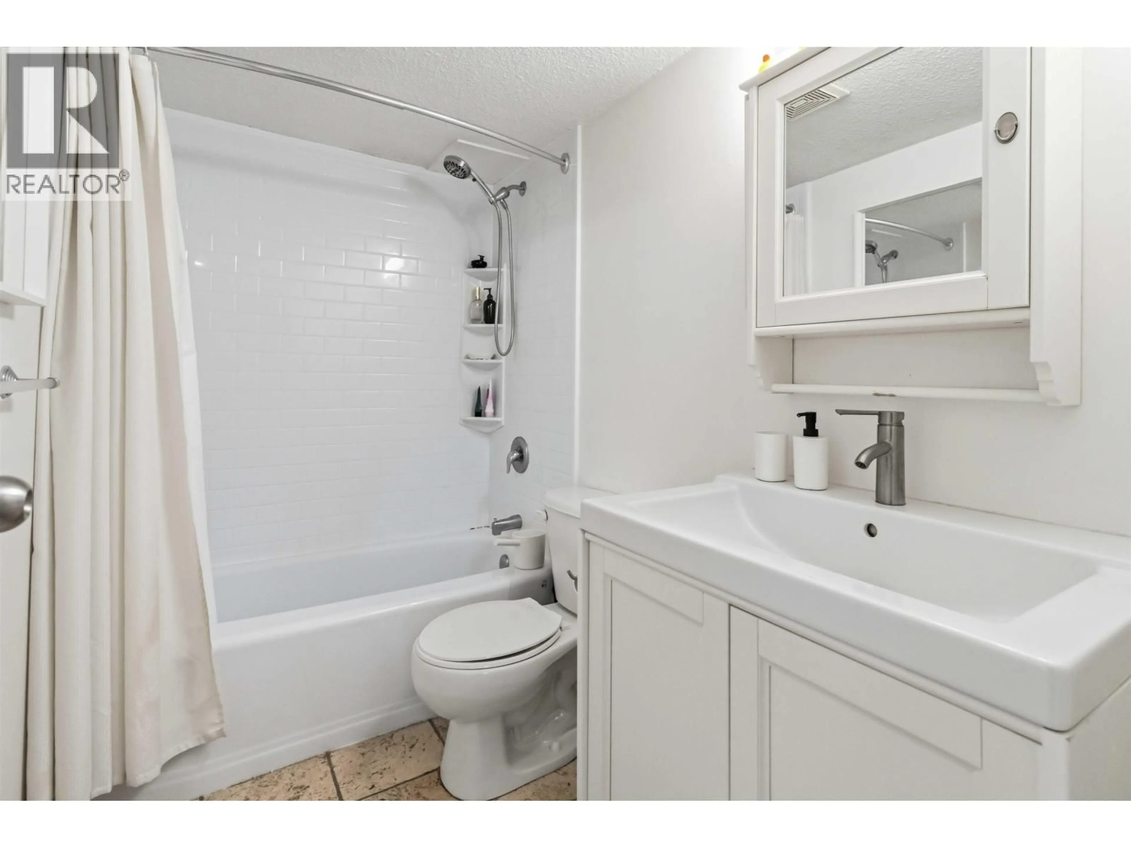 Standard bathroom, ceramic/tile floor for 206 - 1334 73RD AVENUE, Vancouver British Columbia V6P3E7