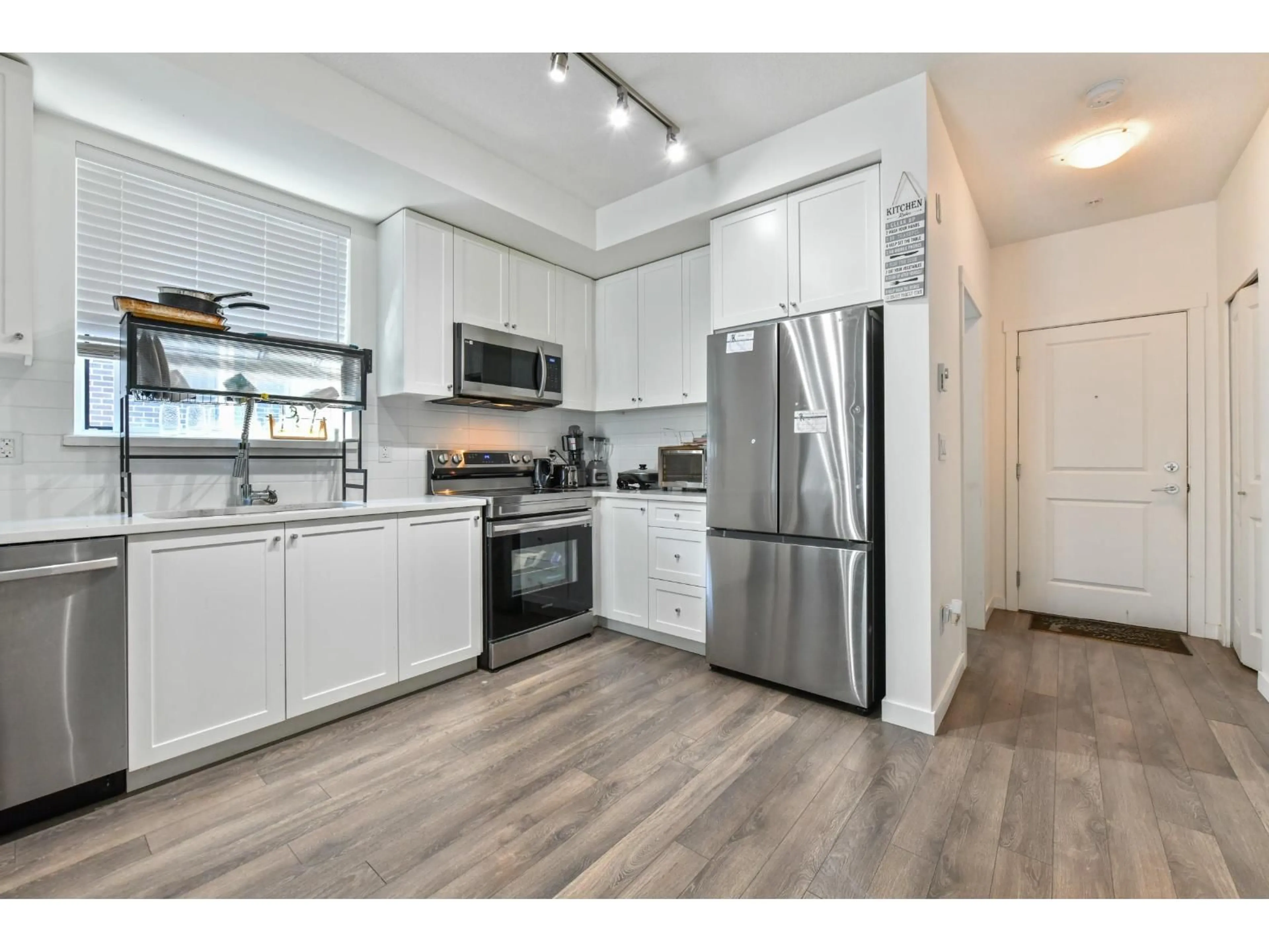 Open concept kitchen, unknown for 306 - 15848 FRASER HIGHWAY, Surrey British Columbia V4N6X6