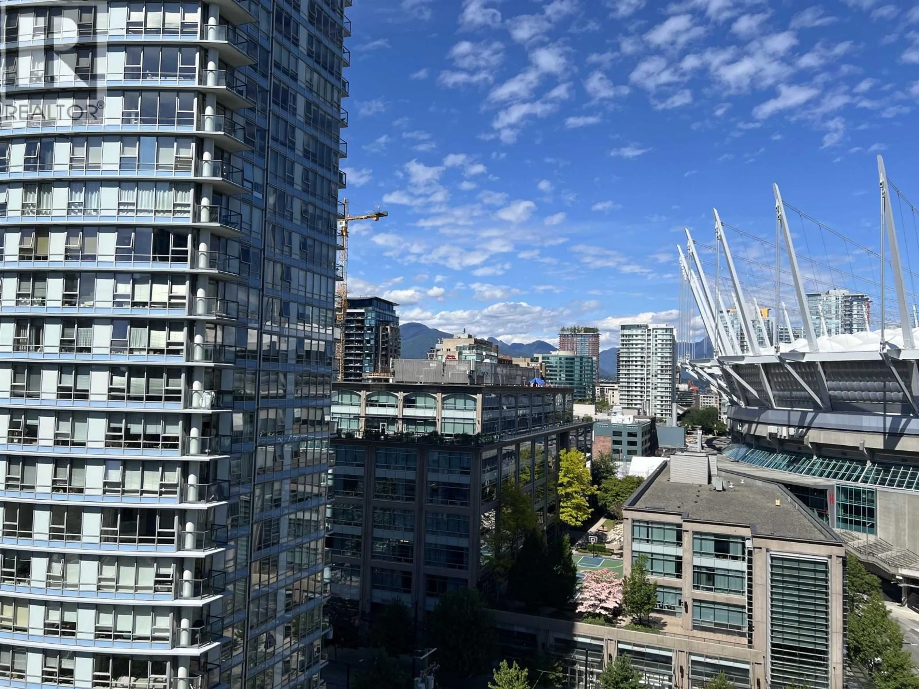 A pic from outside/outdoor area/front of a property/back of a property/a pic from drone, city buildings view from balcony for 1707 - 939 EXPO BOULEVARD, Vancouver British Columbia V6Z3G7