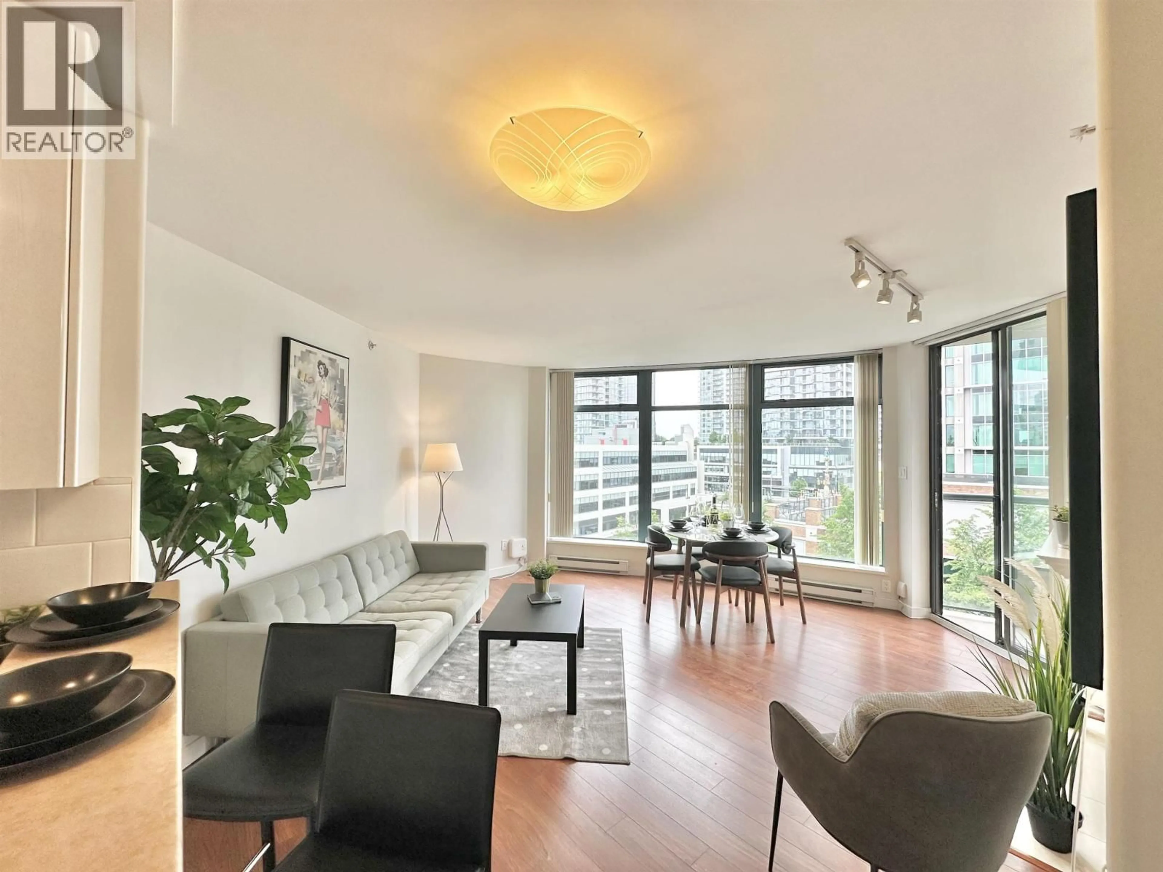 Living room with furniture, wood/laminate floor for 902 - 4567 HAZEL STREET, Burnaby British Columbia V5H4V4